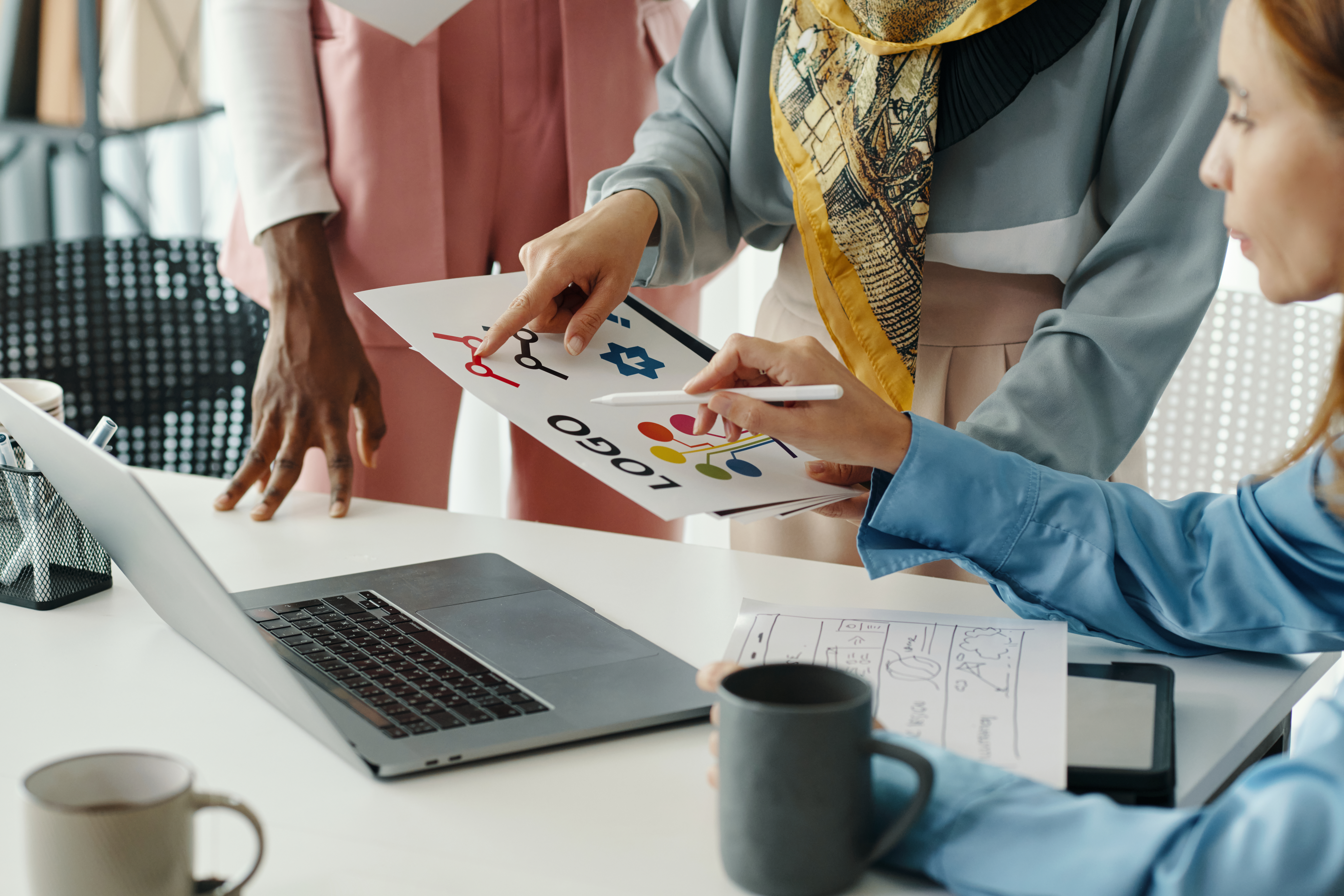 collaborating on design project in modern office 63e5b6946dcd2cac2ece