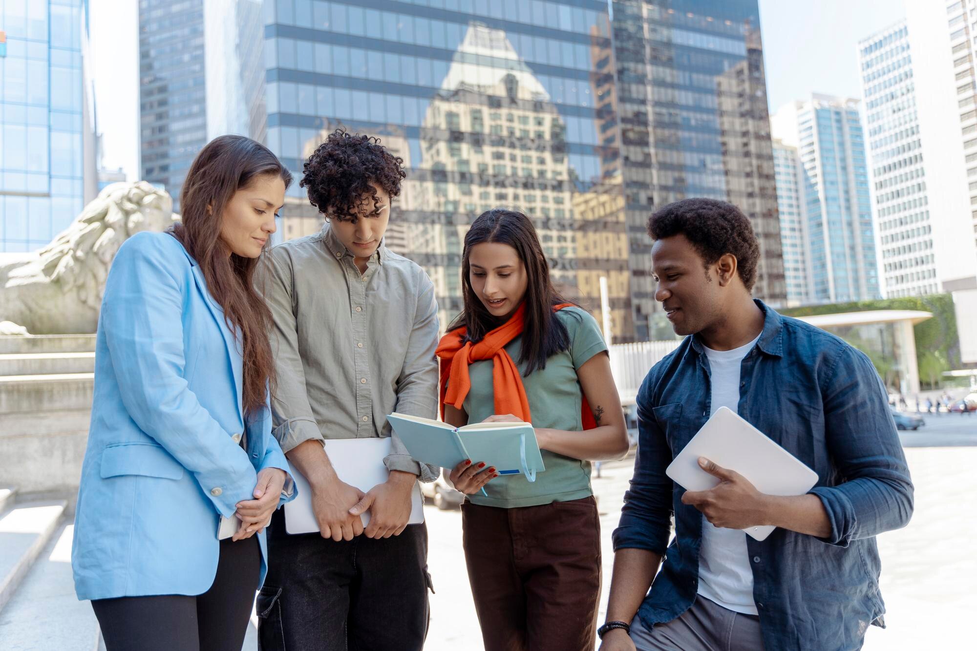 Colleagues Talking On Street Planning Startup Youn Cf76923C0Aacd127A93F
