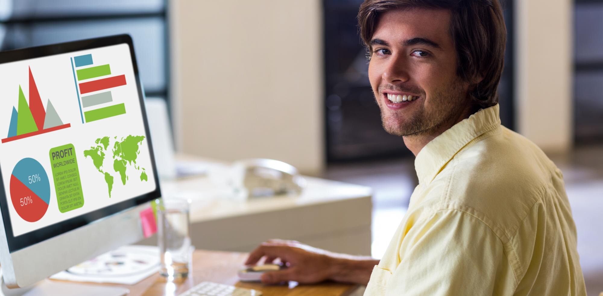 Man smiling while working on a computer displaying colorful graphs, charts, and a world map, representing digital marketing strategies and ROI for Australian businesses.