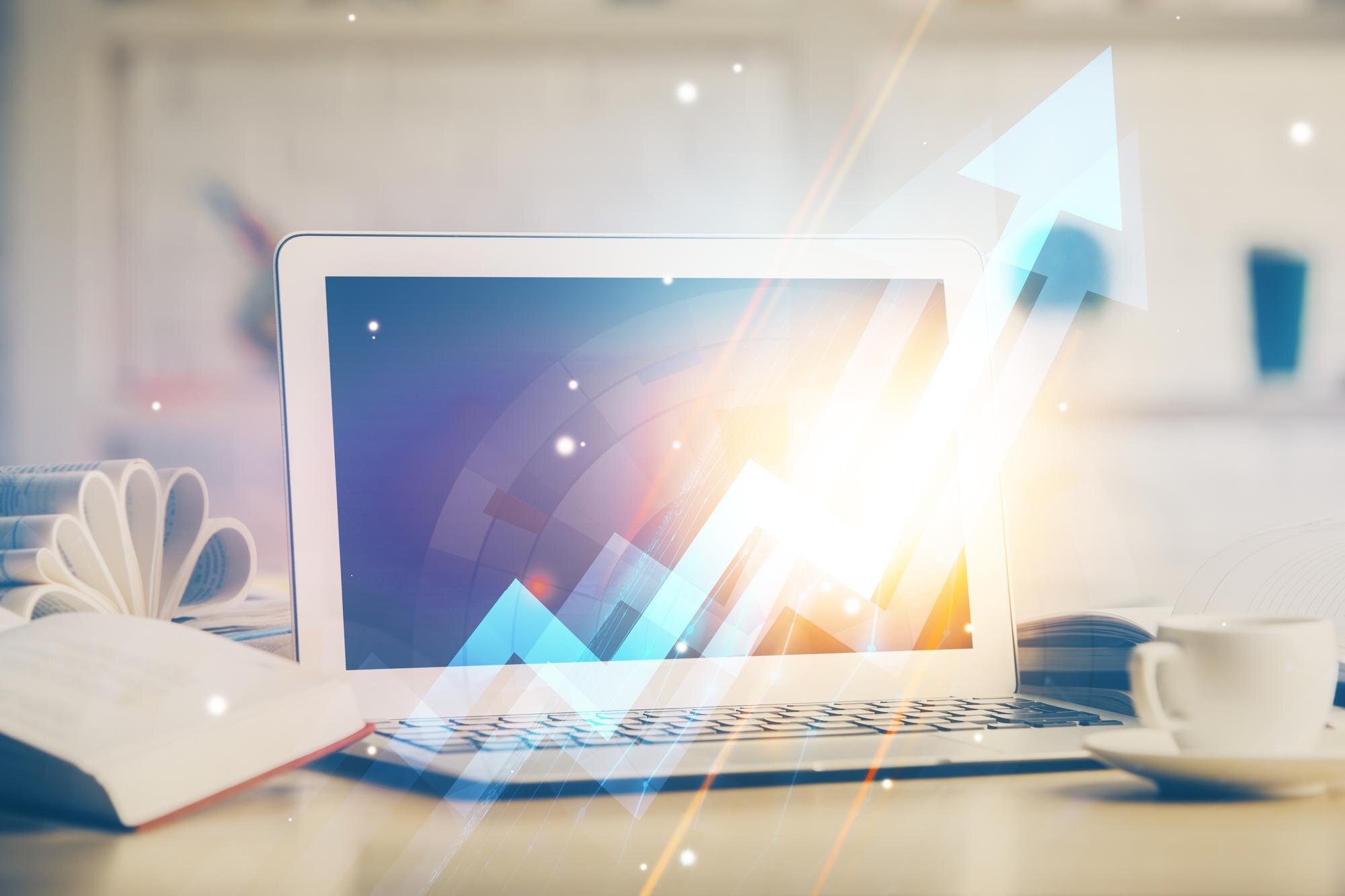 computer on desktop with point up arrows hologram 535f66b8e82fbd465ce1