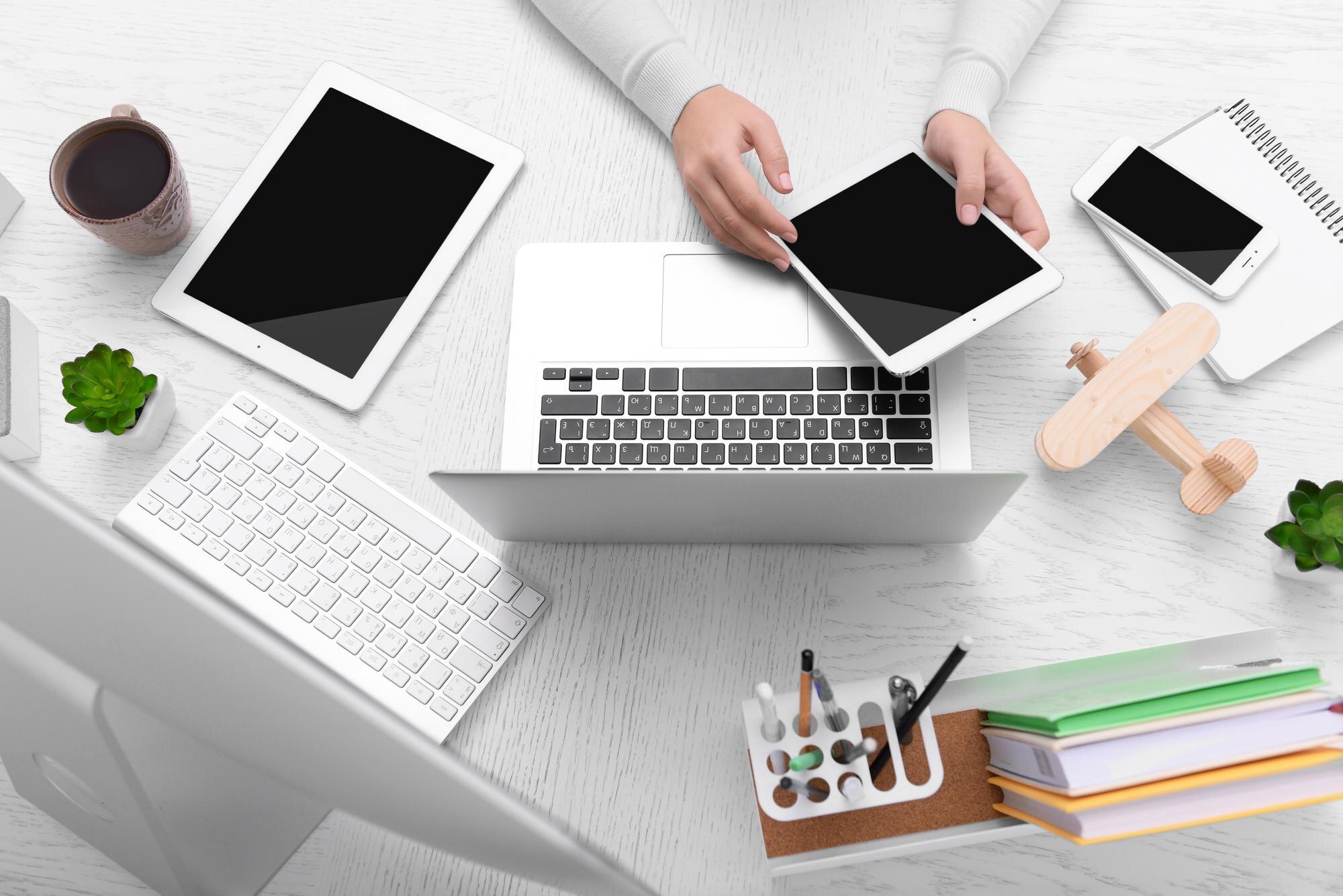 concept of using electronics businesswoman works a 065e1b2c84f7484e234f - MedWell Digital Marketing Agency