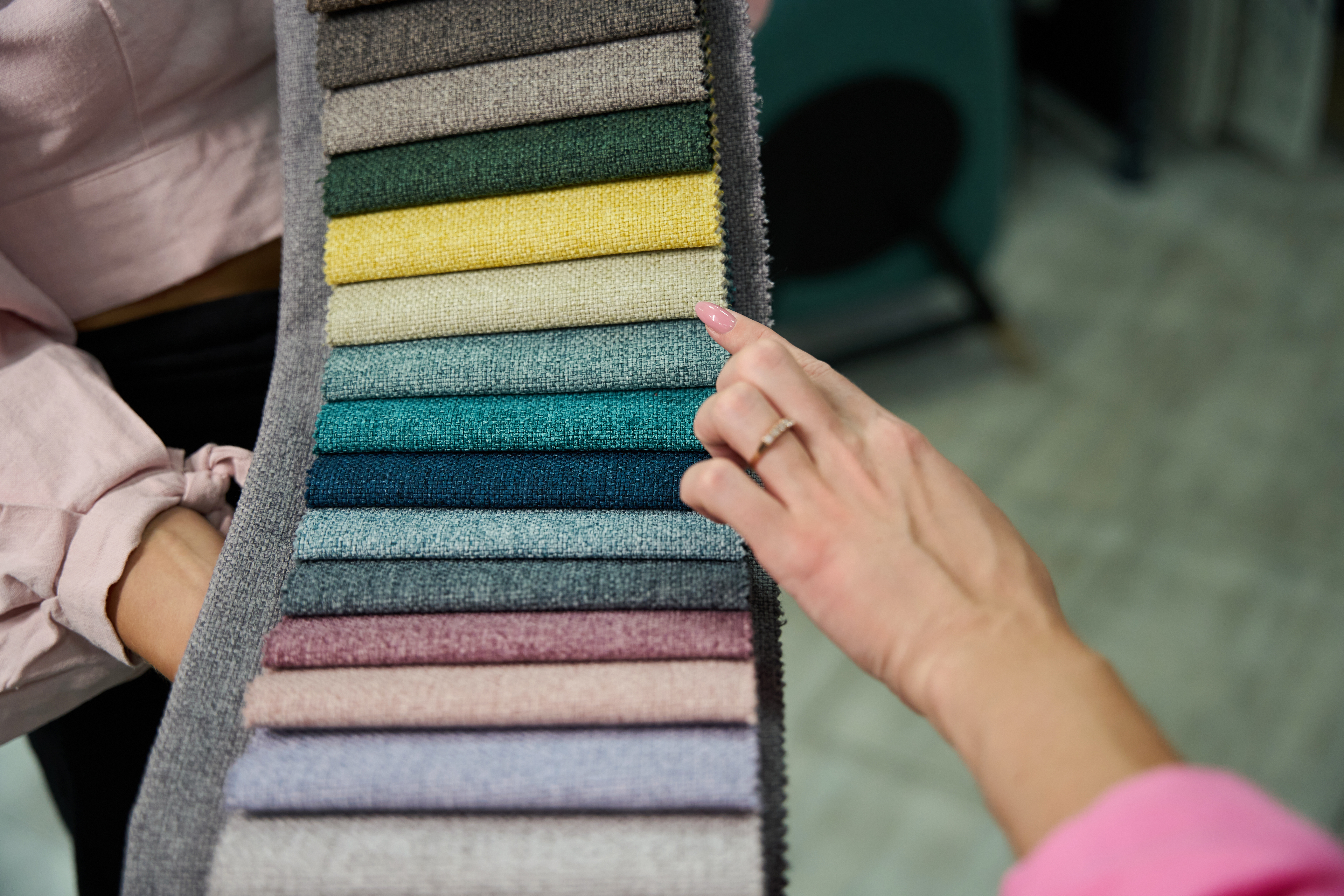 Get it right first go: why expert guidance matters in plastic material selection 2 consultant demonstrates samples of materials for a 9d5642b44407061b1f14