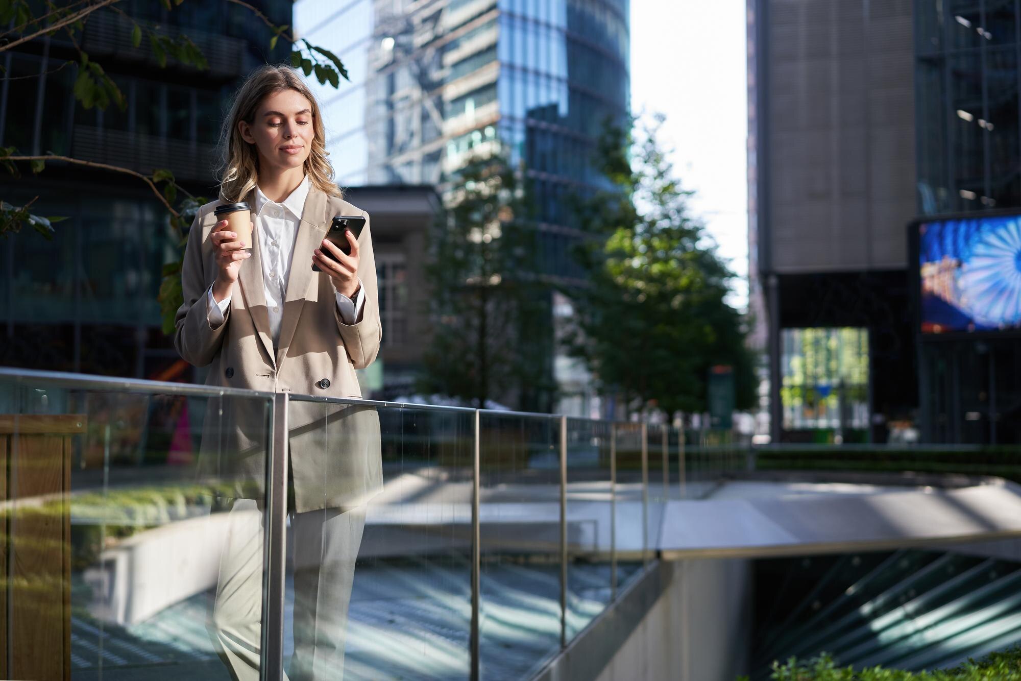 corporate woman in beige suit drinks morning coffe db9e53ed521abe42c071 Effortless Beauty and Wellness Scheduling for Busy Professionals