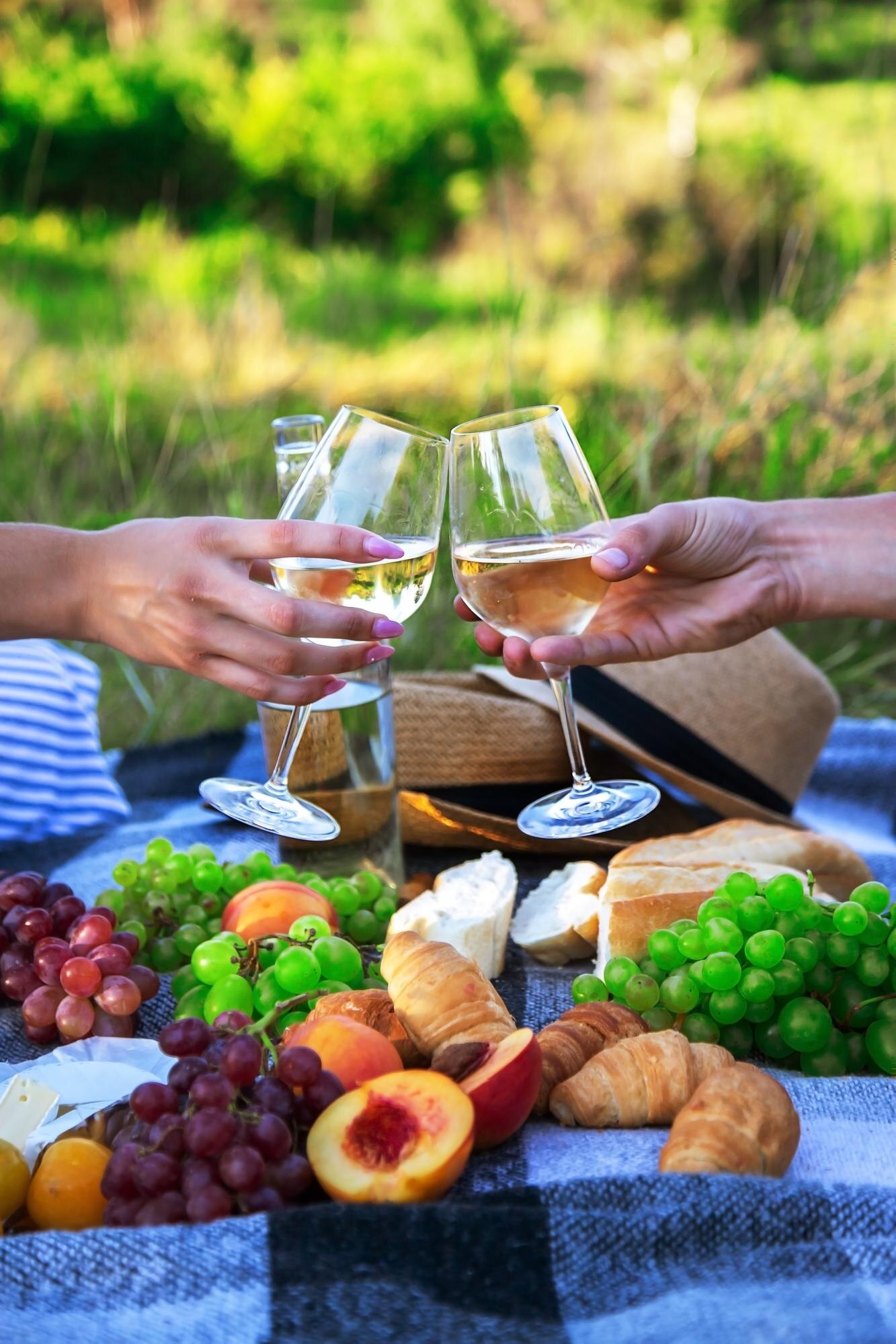 The hidden art of pairing Hill Country wines with the bites locals actually love 8 couple in love drinking white wine on a picnic sel bfc7f000e4473370b5ac