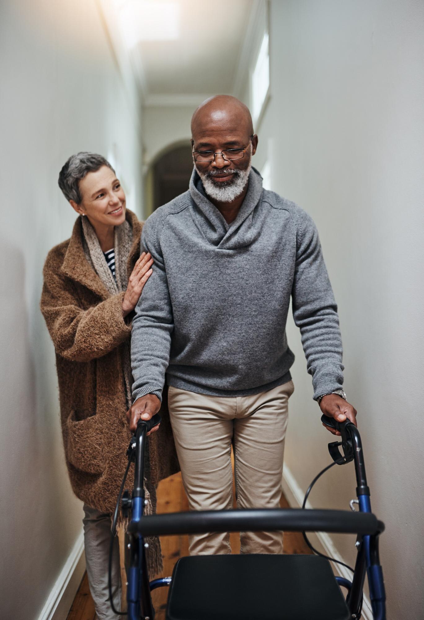 couple walker and helping man in home love and sup 4e3ddd1c321a9e73150a