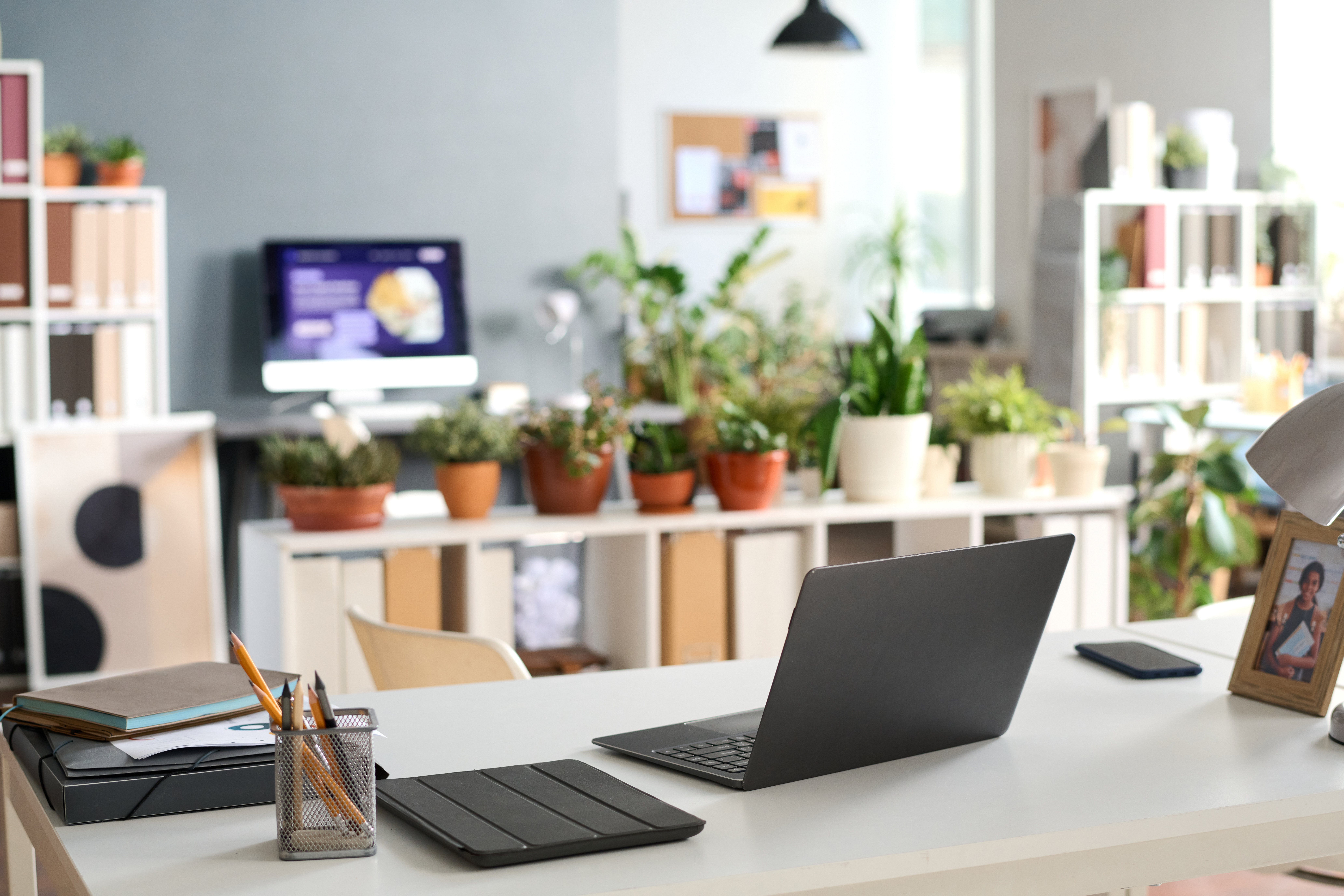 cozy office interior with laptop on desk 3b4542551690ecfd4b5f