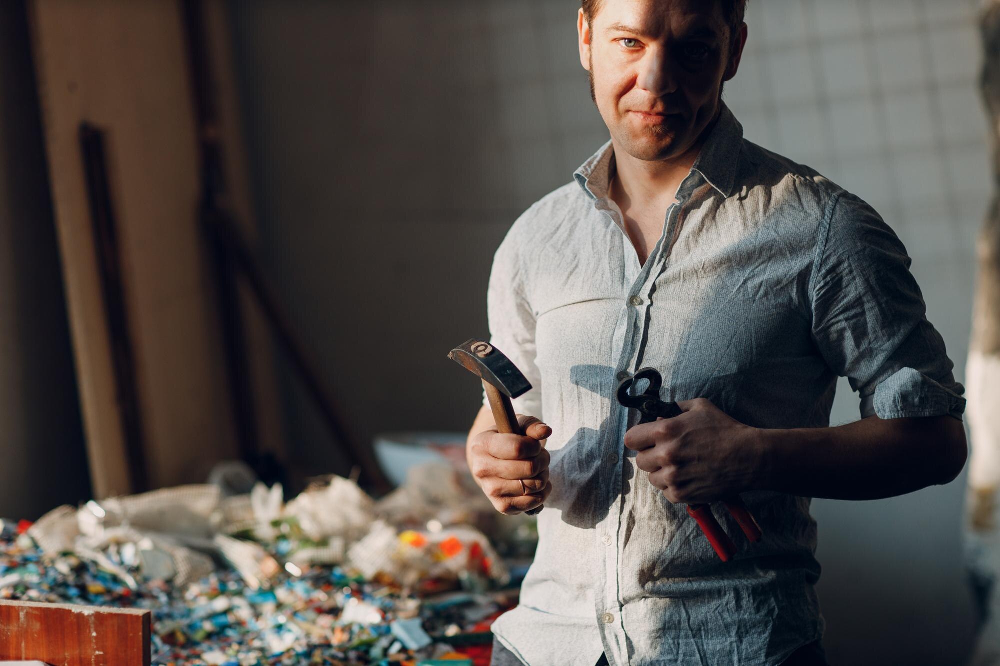 How Local Plastic Fabrication Supports Sustainable Practices in Australia 3 craftsman male master portrait hold hammer and sma fb1b0274c73ce81792cf