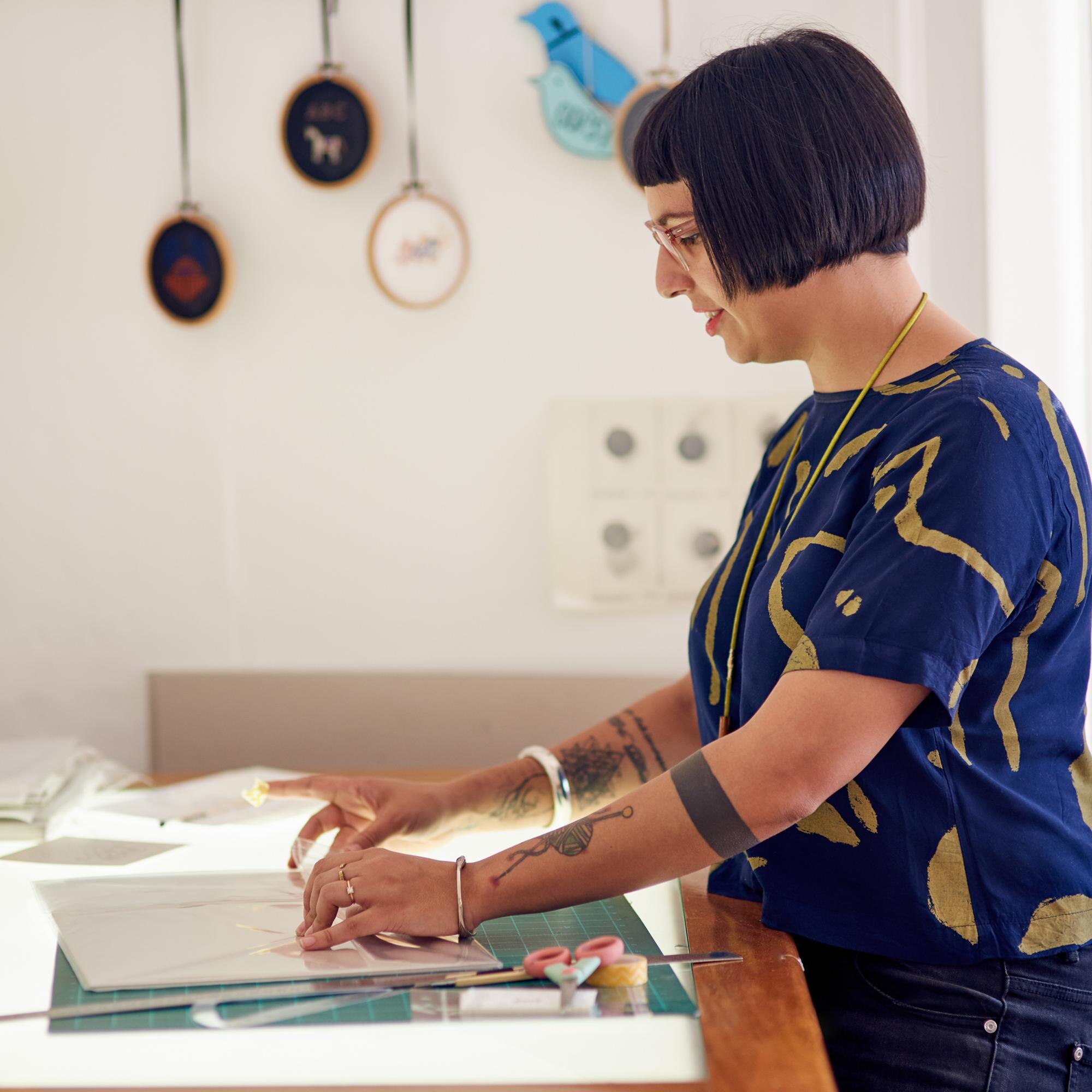 The Benefits of Choosing Local Plastic Fabrication in Australia 2 craftswoman light table and designer drawing in st 7eec3fdfc9a610cb477d