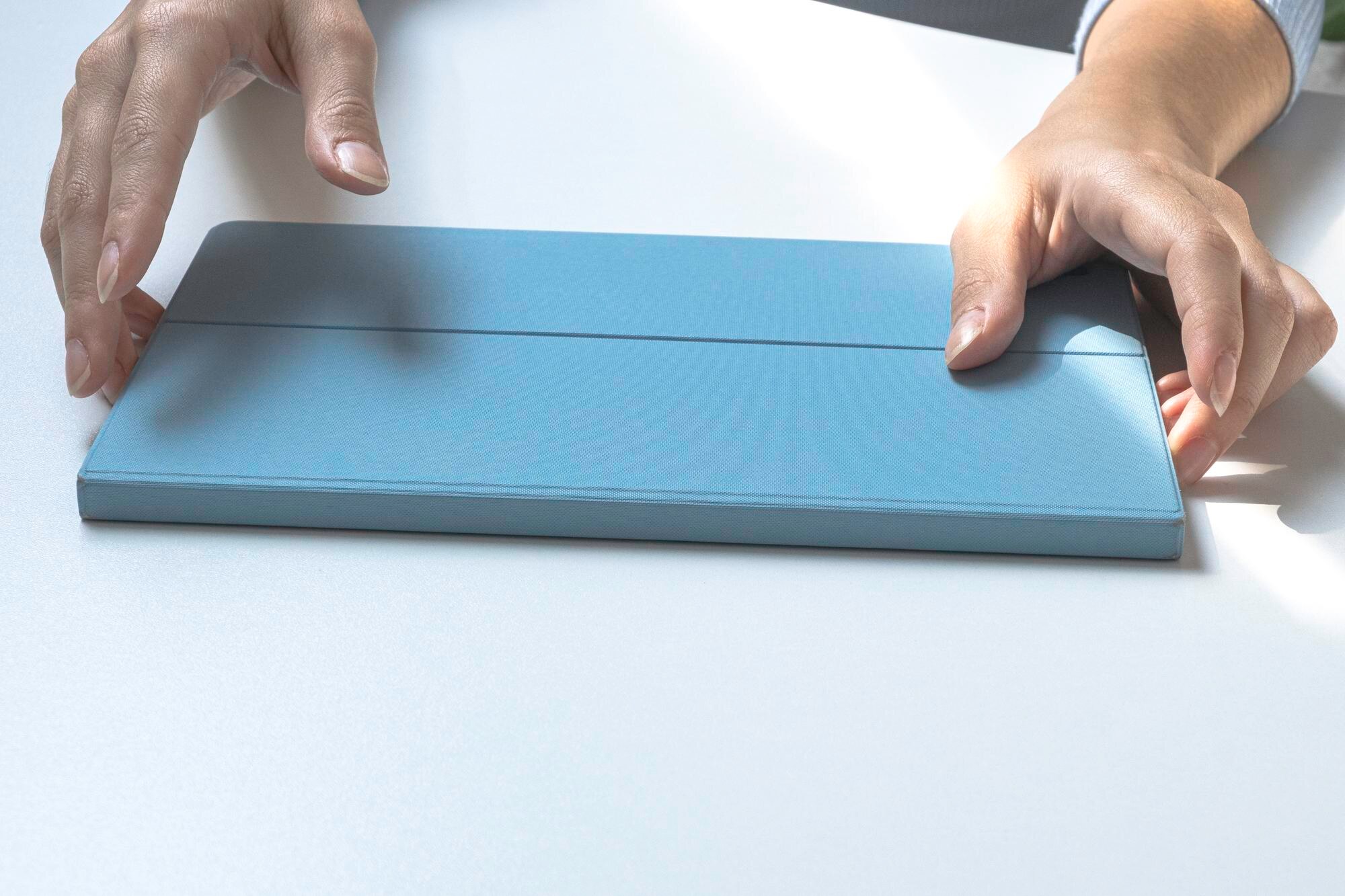 Cut-to-Size Plastic Sheets: Reduce Waste, Save Costs, Build Smarter 1 cropped hand of person holding book on white backg 45bebf7d02900b349d36