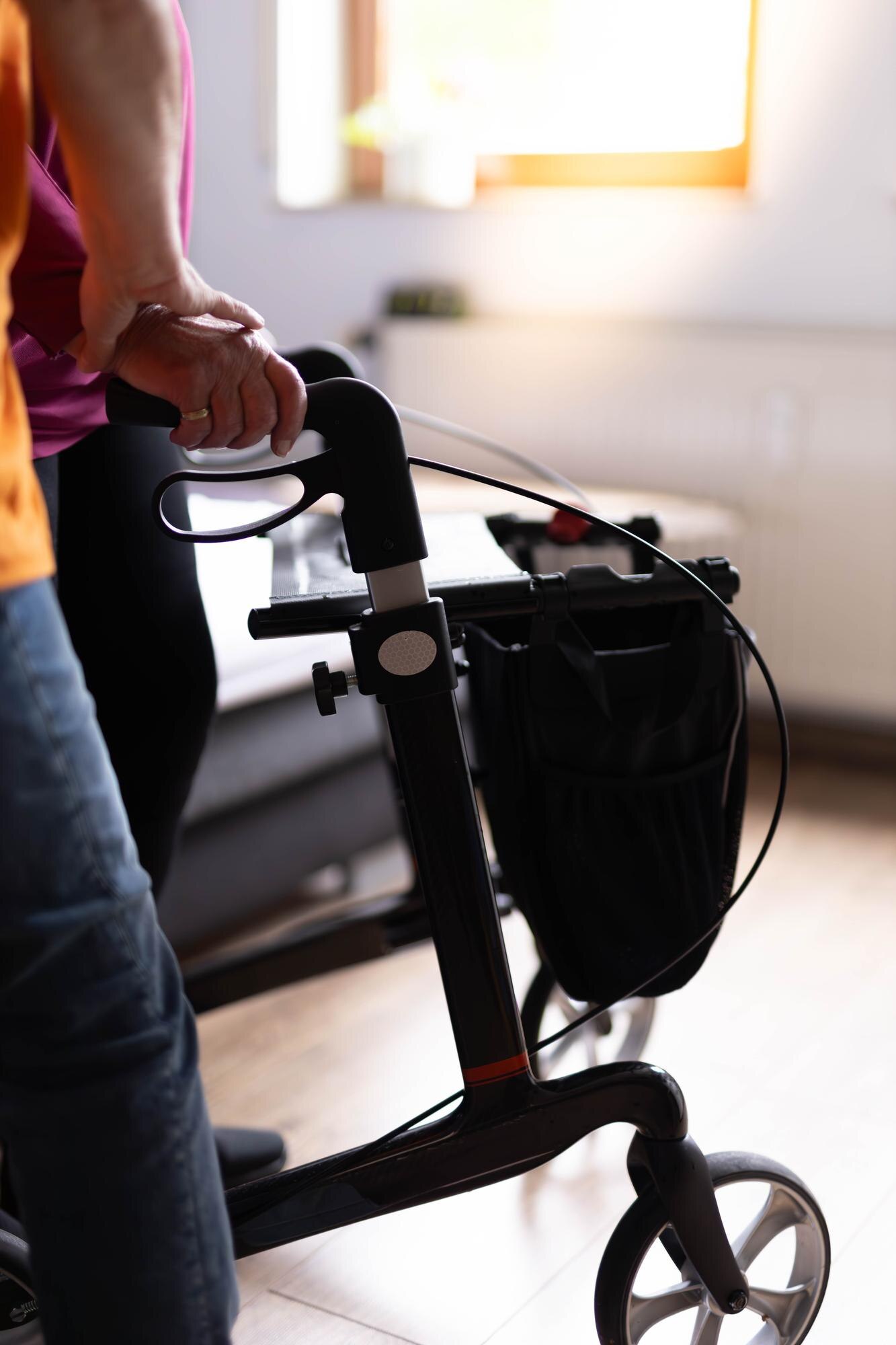 cropped image of nurse helping senior woman to wal aaf8ed938c2bb97c1418