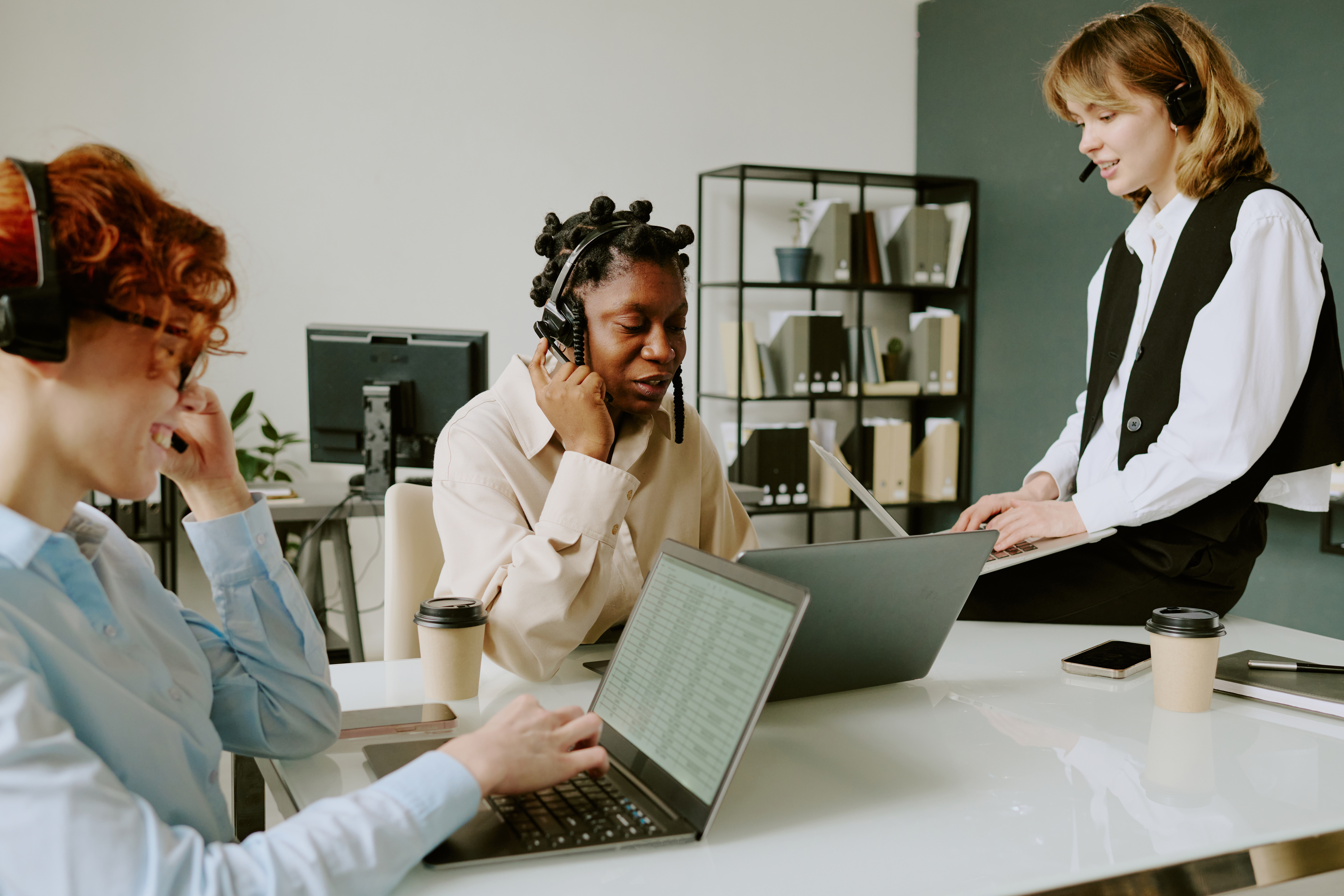 customer service team collaborating in modern offi 5b6cc3a3d62720cb419e