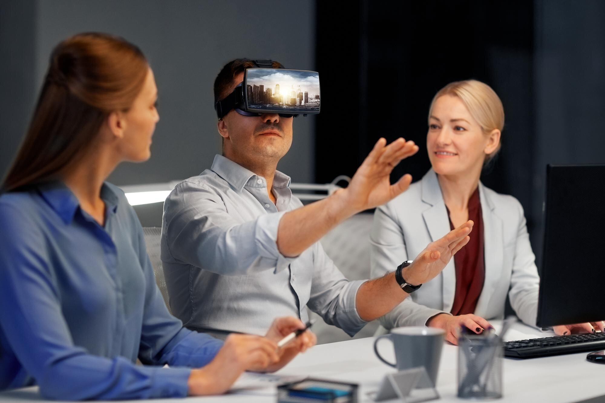 developers with virtual reality headset at office b292c30314cb4bb60b66