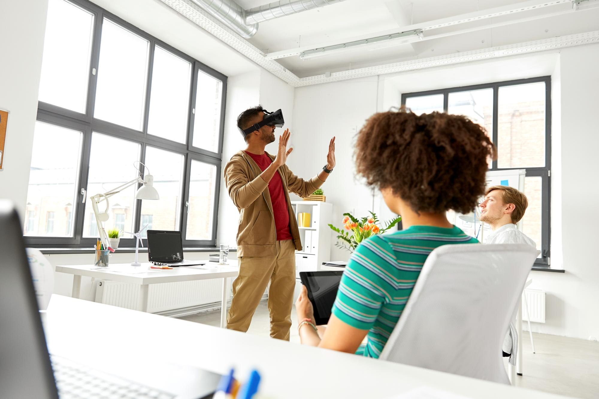 developers with virtual reality headset at office f3cc3c9bc6fcb4c9cf7e