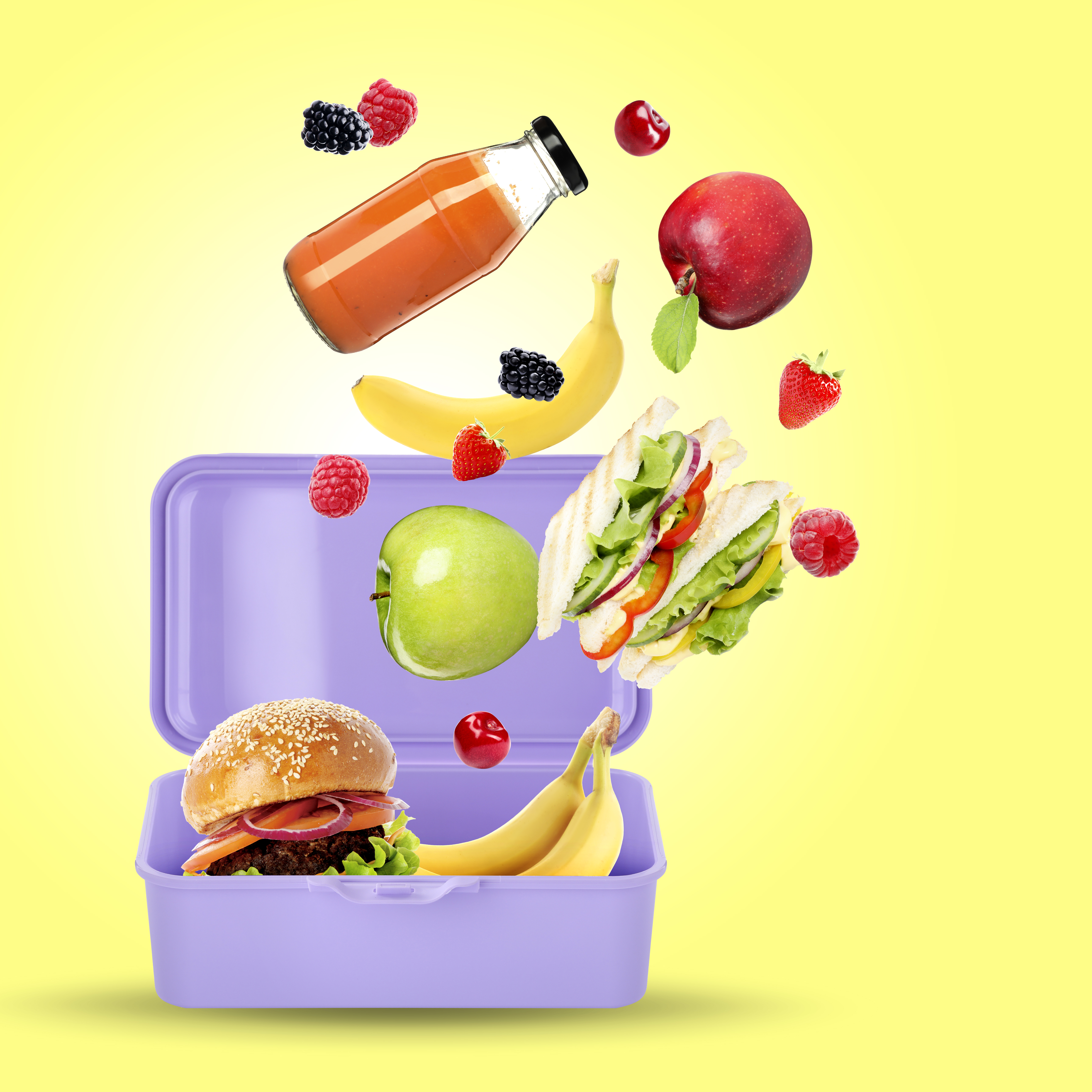 Fuel Up, Power On: Why Busy Pros Choose Fresh, Handcrafted Meals 1 different fresh food falling into lunch box on yel 1f037fff64614dc0c737