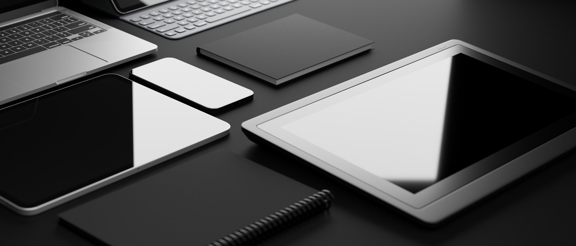digital devices on black table with drawing tablet 90d4623e04564bcf8095