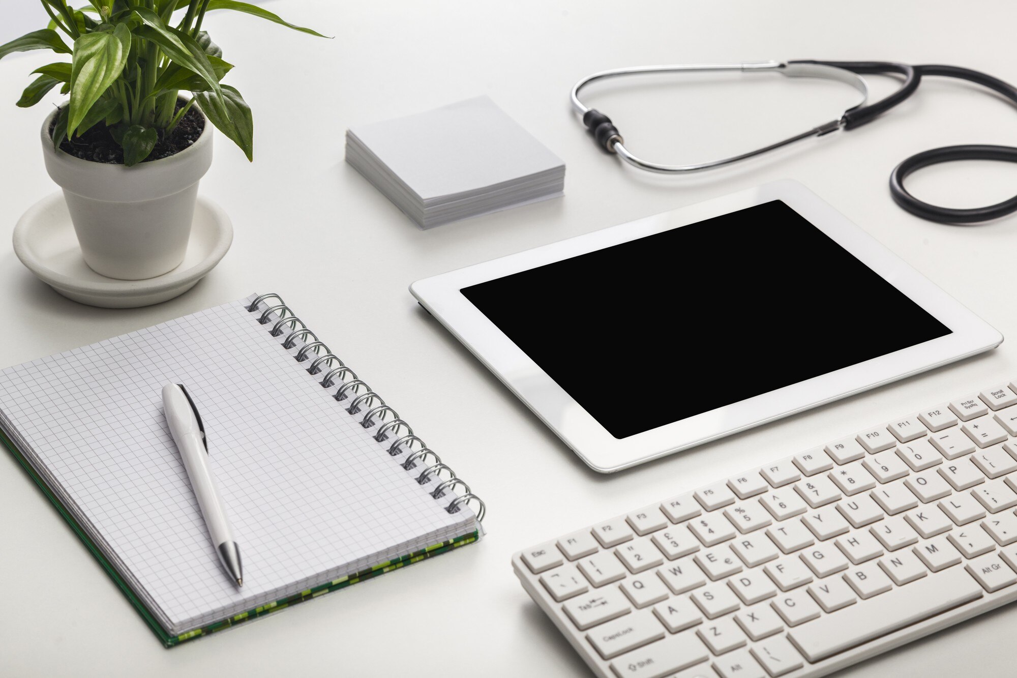 Balancing Professionalism and Approachability in Brand Messaging for Health and Wellness Professionals 1 - MedWell Digital Marketing Agency digital tablet with green plant pen notebook and 038175d5fb1fa61fe364 - MedWell Digital Marketing Agency