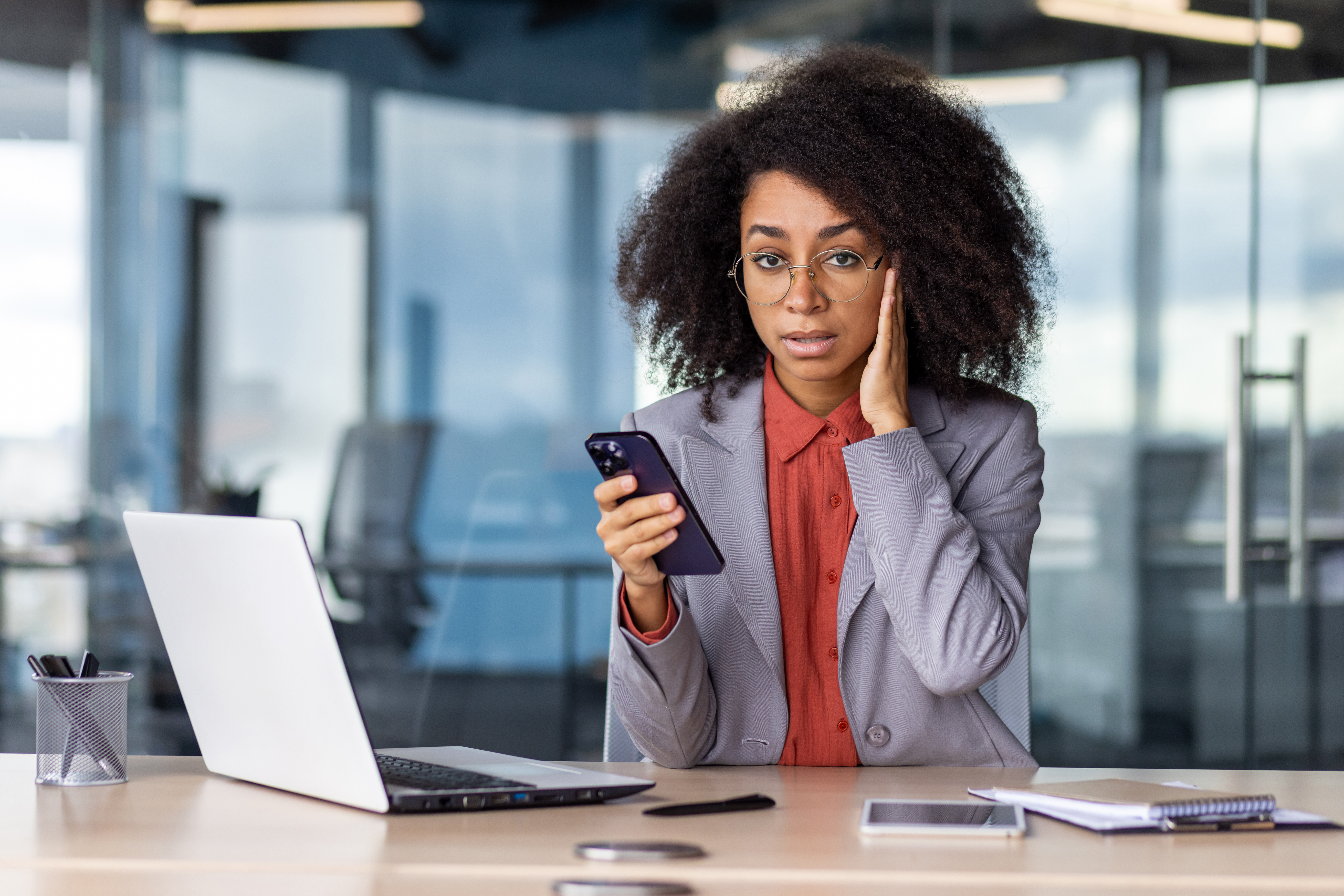 Science-Backed Strategies For Tackling Social Media Stress 4 Dissatisfied Female In Shirt And Jacket Using Smar 70Bbb3Ced848E6C8C7Dc