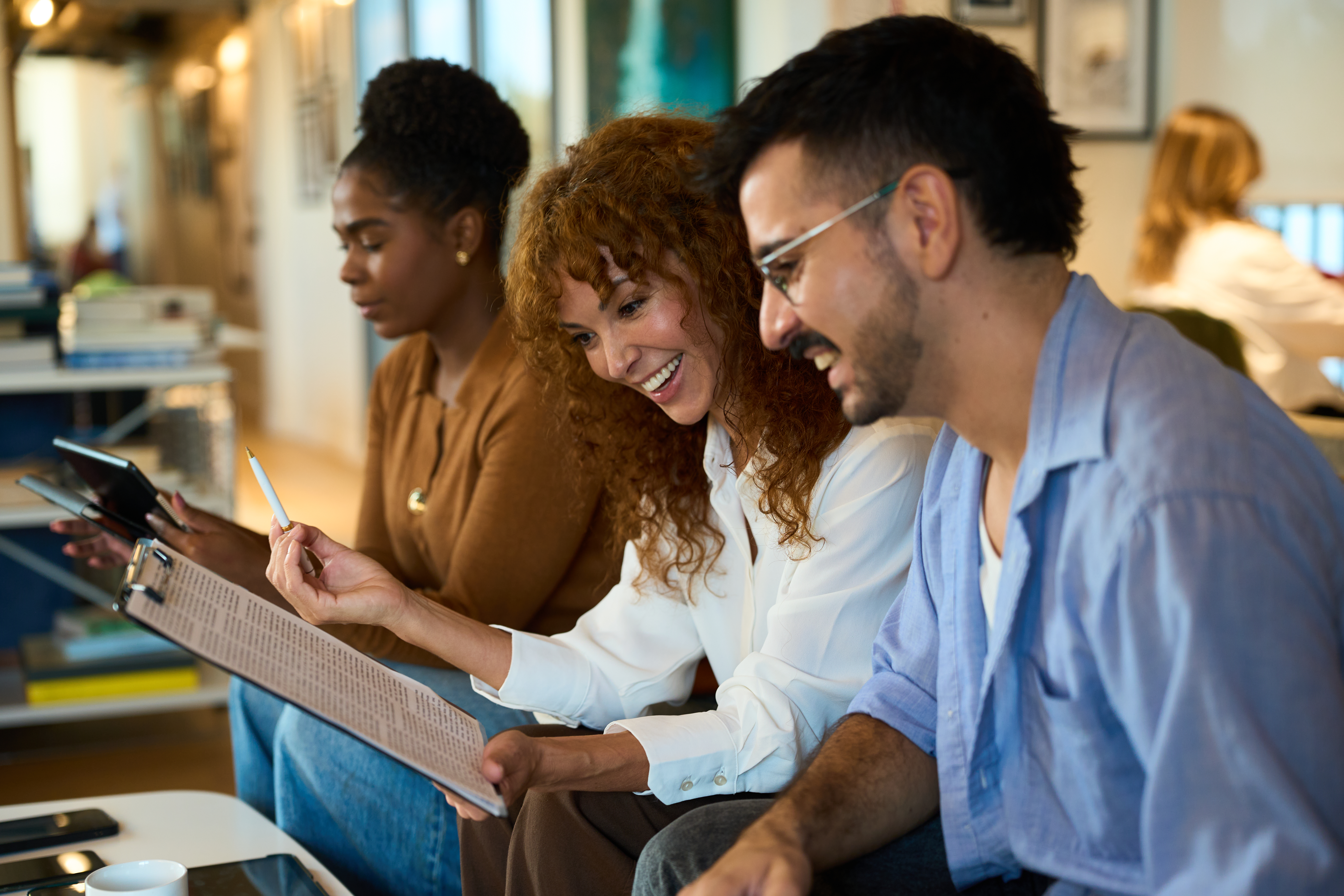 diverse business team collaborating and smiling du e60fc241cd03875b2e79