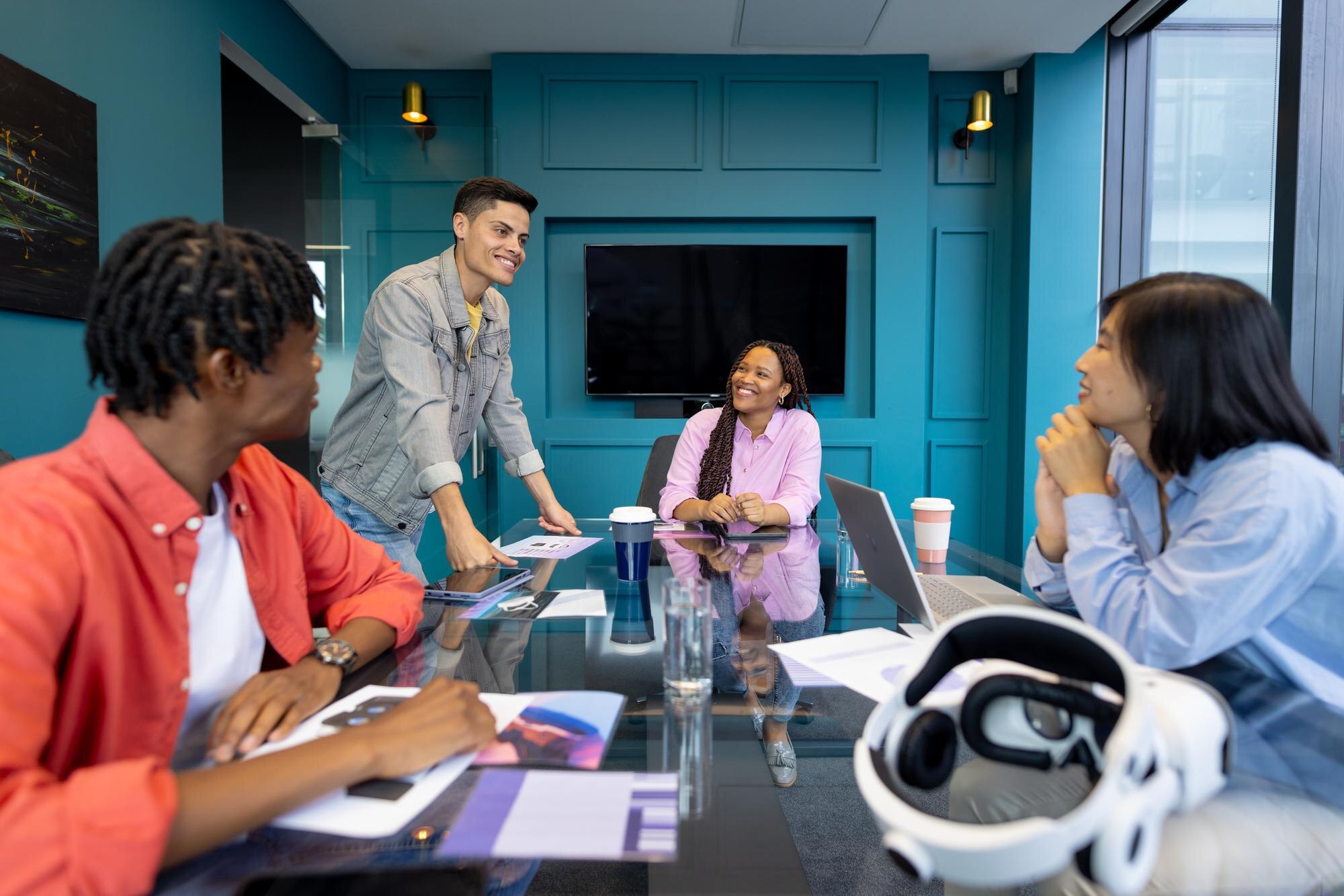diverse colleagues collaborate at a glass table on fa55fbb336d26a6d81b3