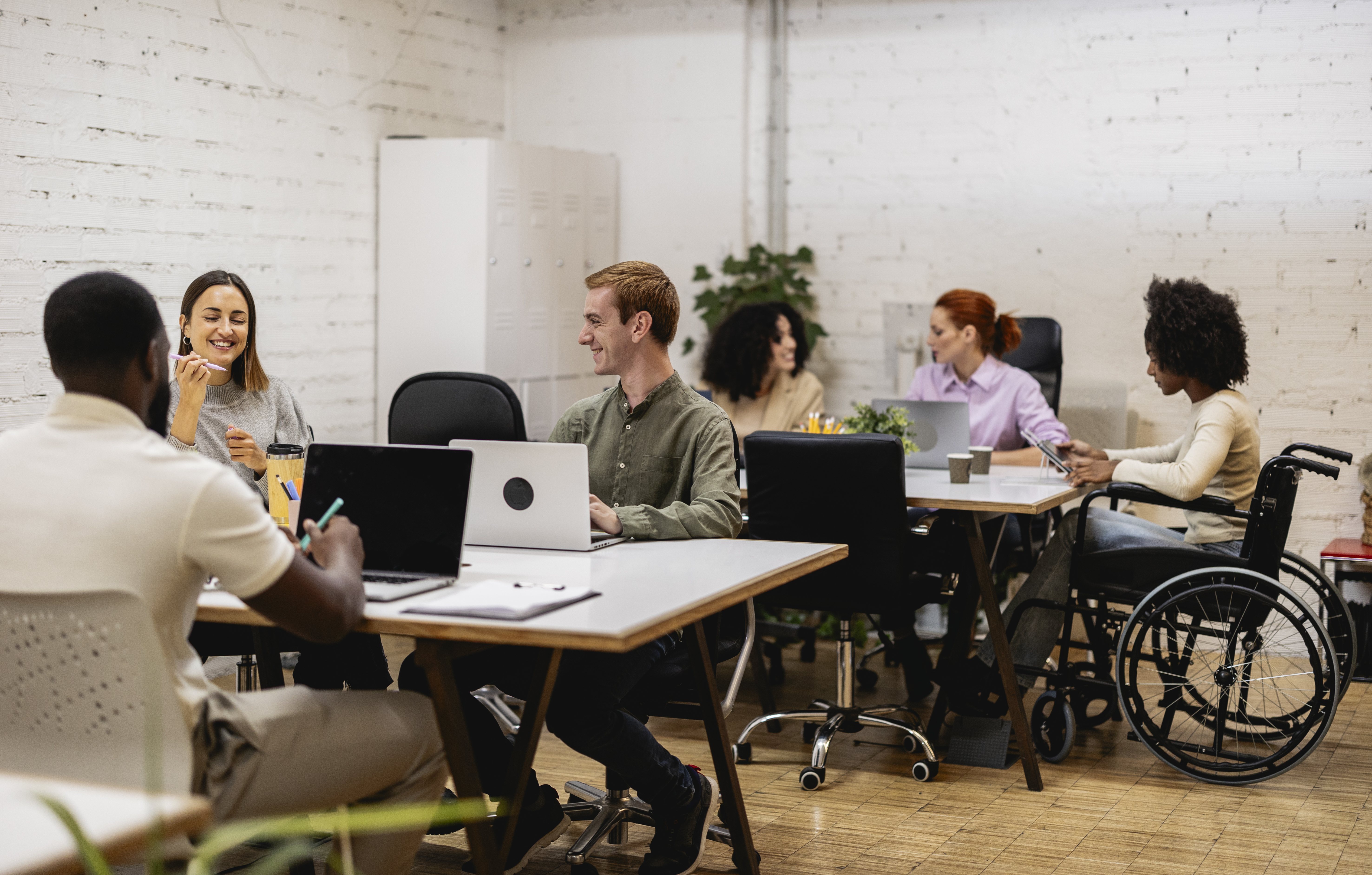 diverse coworkers collaborating in modern inclusiv 905b0c8d442bc9d637ad