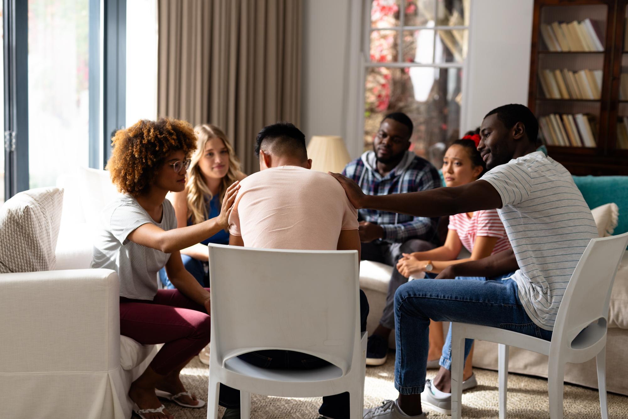 diverse friends listening and comforting each othe f02cedf29b29d6bcd3fe