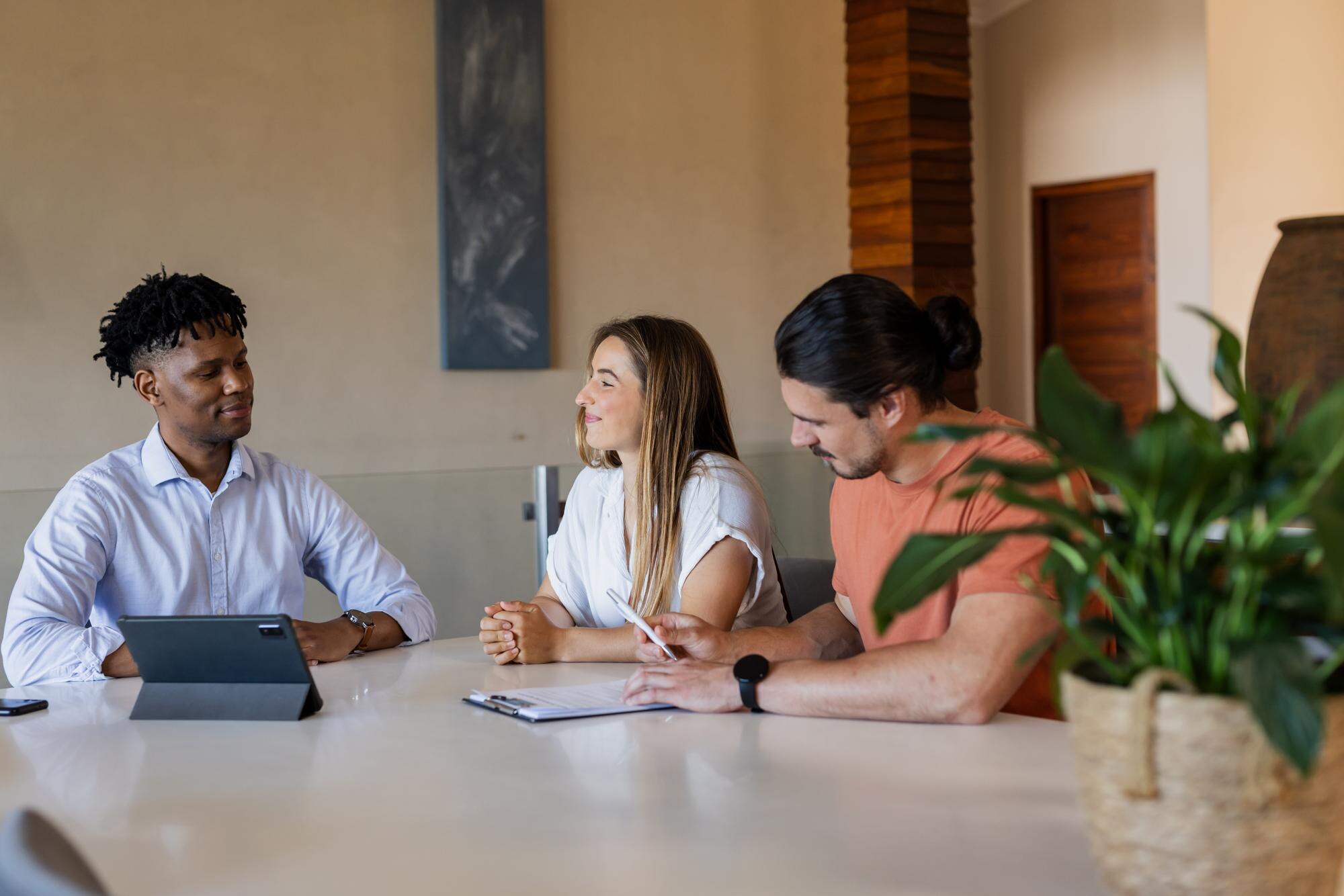 Diverse Group Discussing Project At Office Table W 10518E053316Ba778E08