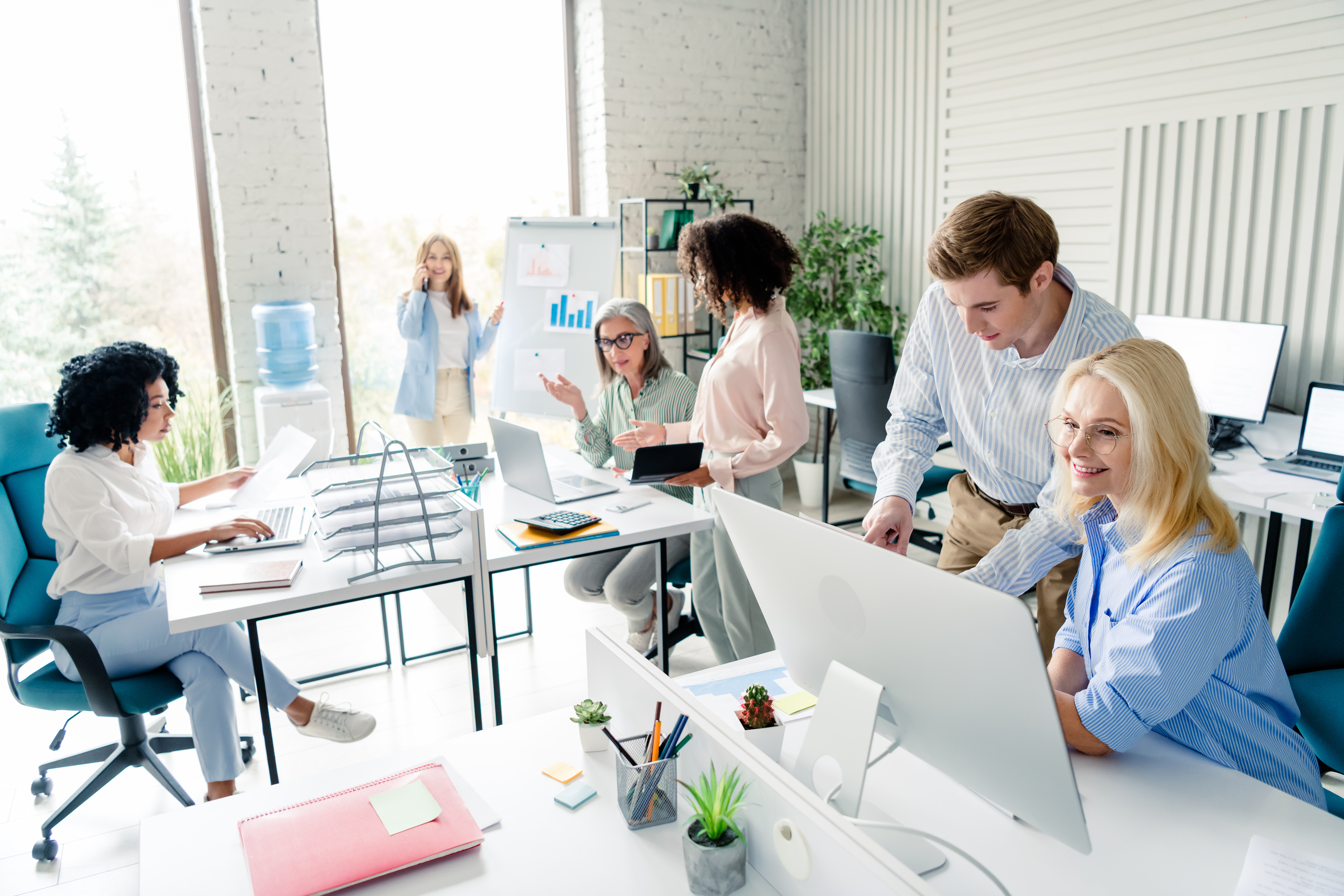 coworkers working together in a coworking space