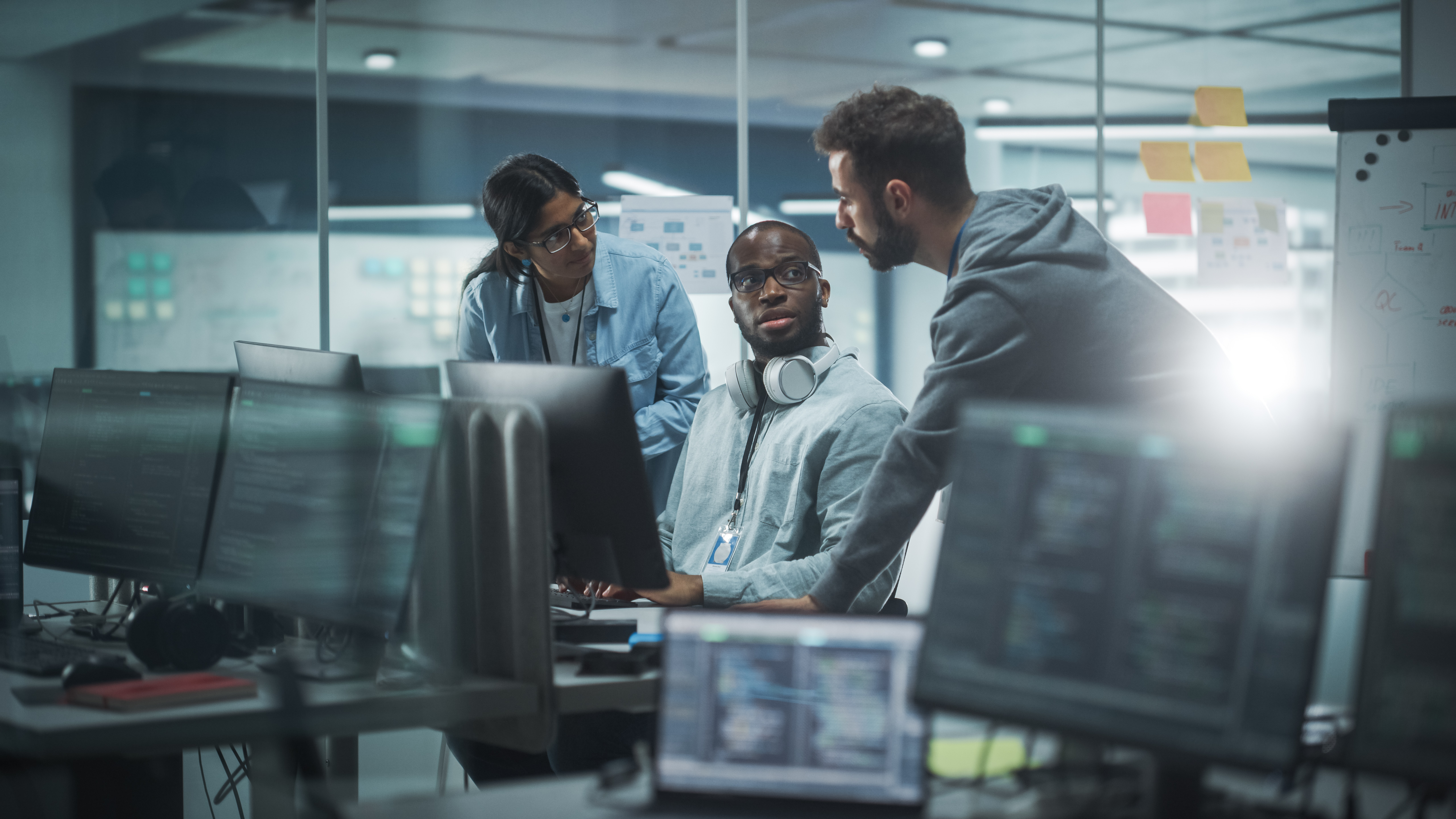 Diverse professionals meeting in modern office