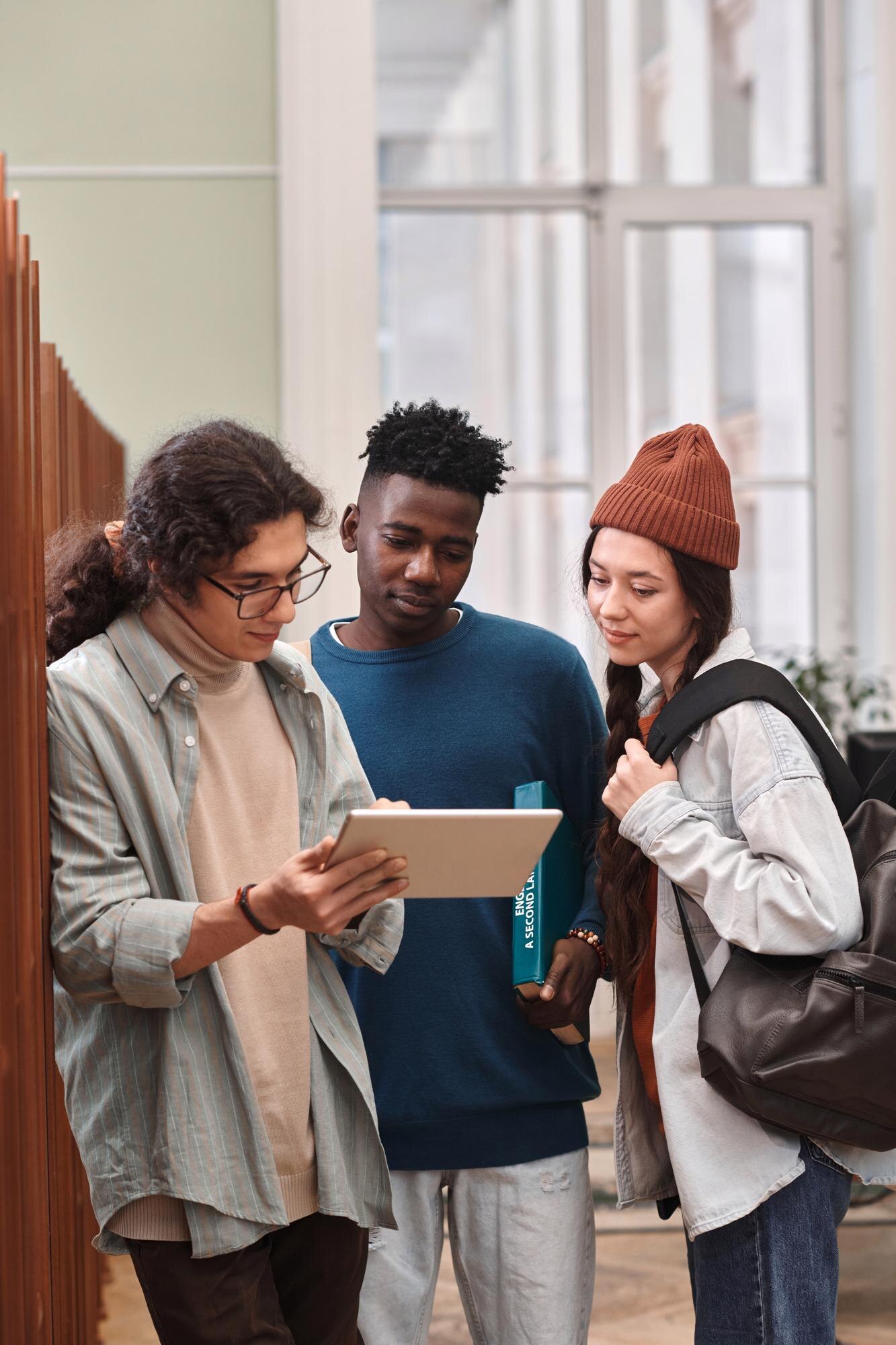 Essential Tips To Stay Compliant On A Student Visa (Subclass 500) In Australia 3 Diverse Group Of Three Young Students Looking At T Dba3E7Ca4Bba844F01F4
