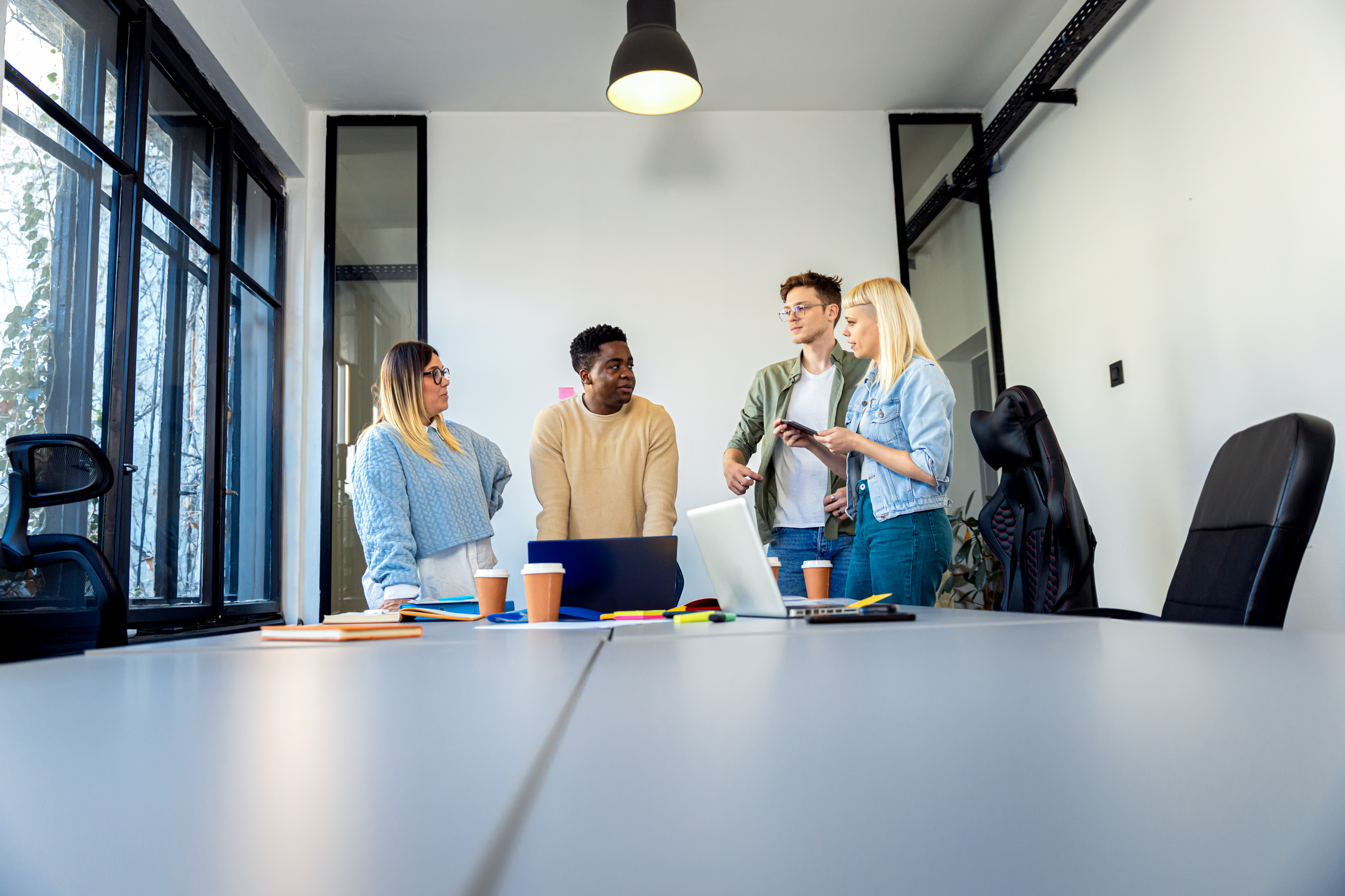 diverse group of young people working on new proje 3ae16c2e7840ee95553c