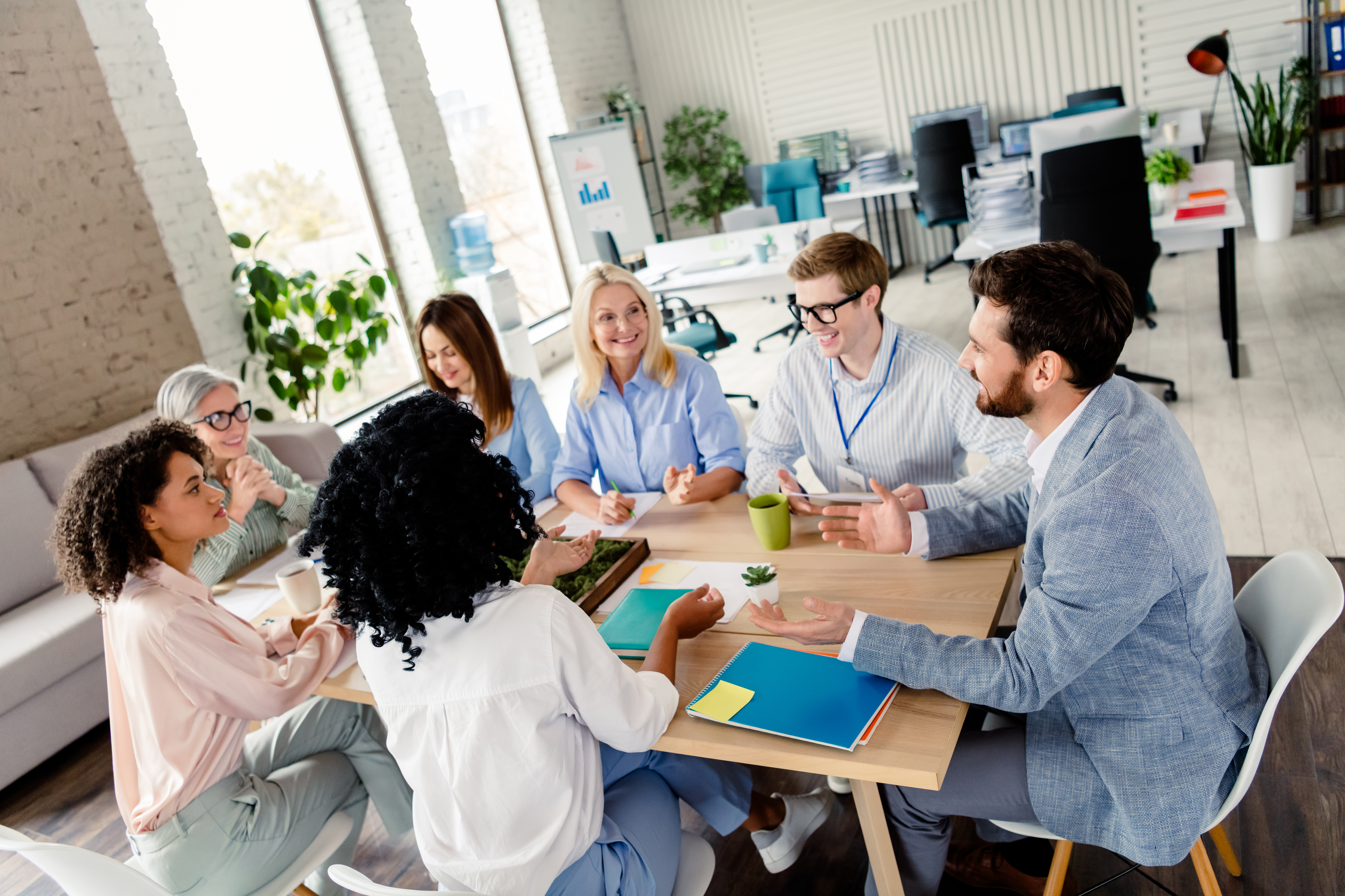diverse team collaborating in a modern office envi f5b7bc11a8d1178aa867