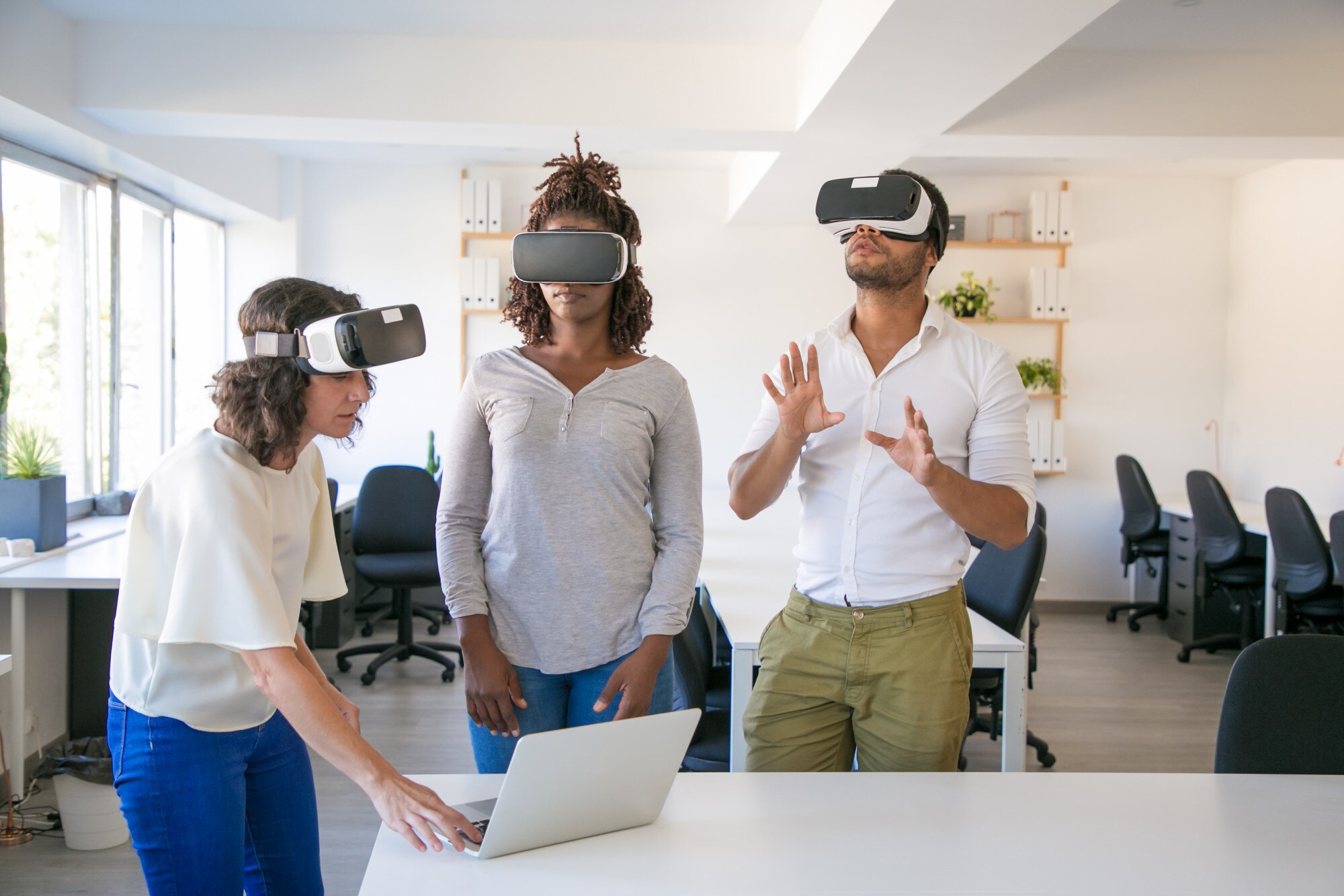 diverse team of three watching virtual presentatio 63136faa5d3cf6464759