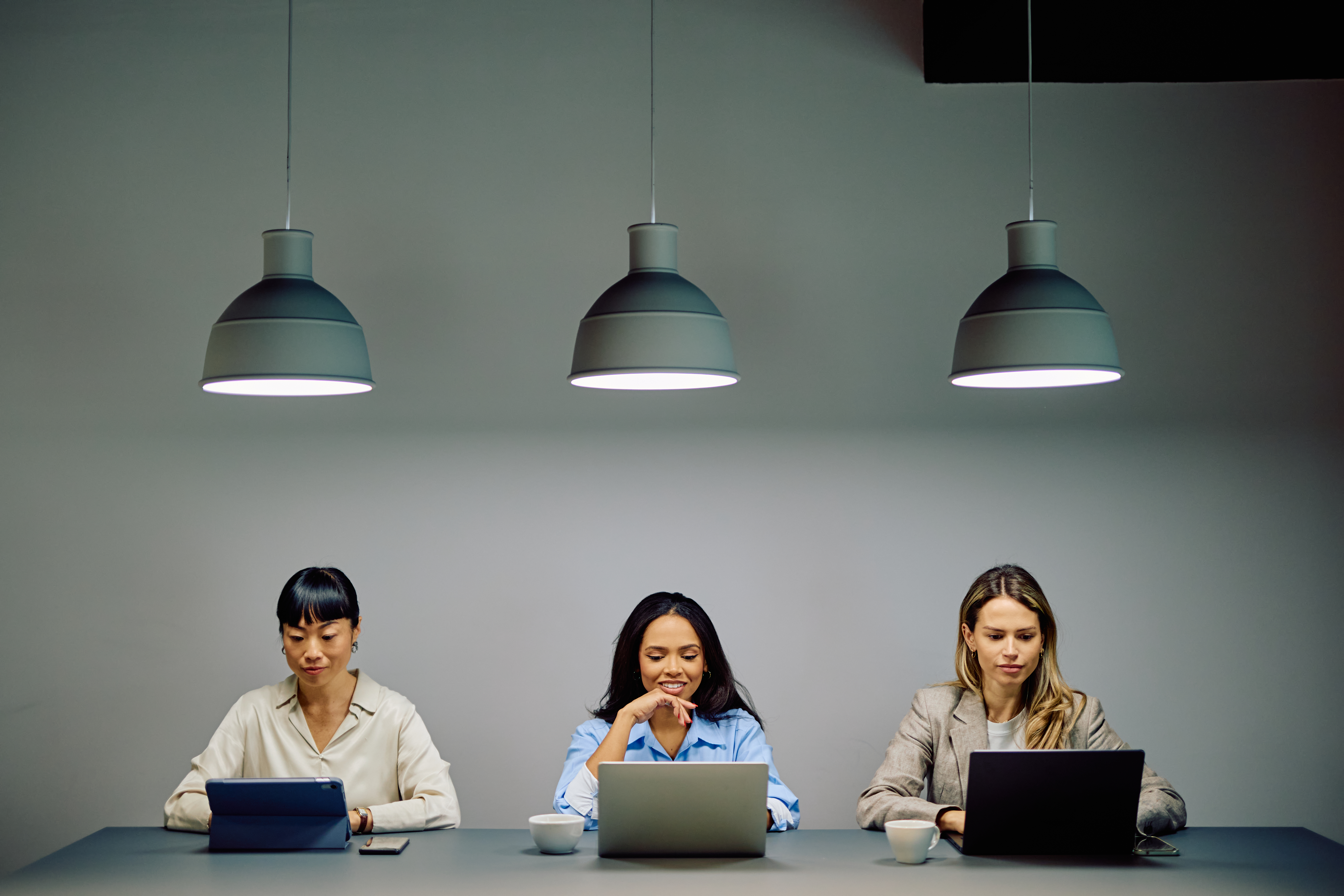 diverse women working on laptops in modern office 29aec20e08c137d3e285