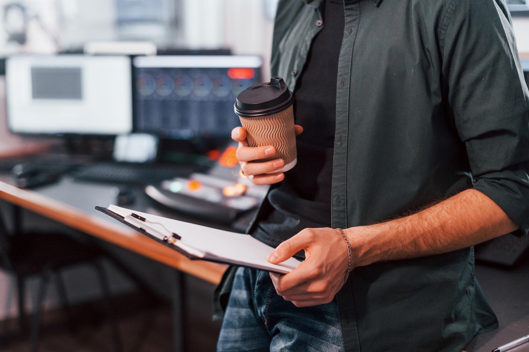 document with scenario young man is indoors in the 4f19fb6a7e29c18f2c9f