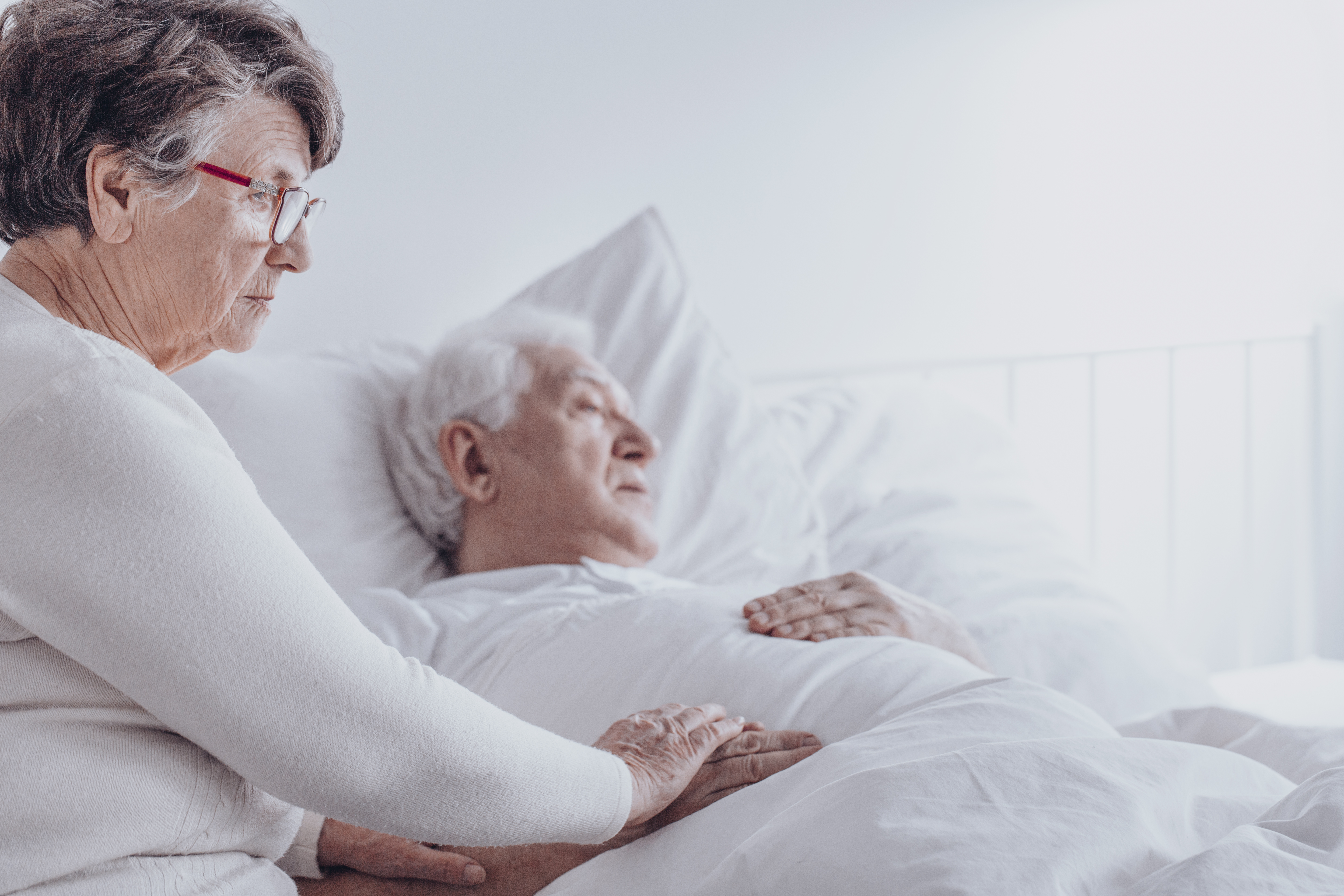 elderly woman supporting sick husband dd40a9bf77596d241191