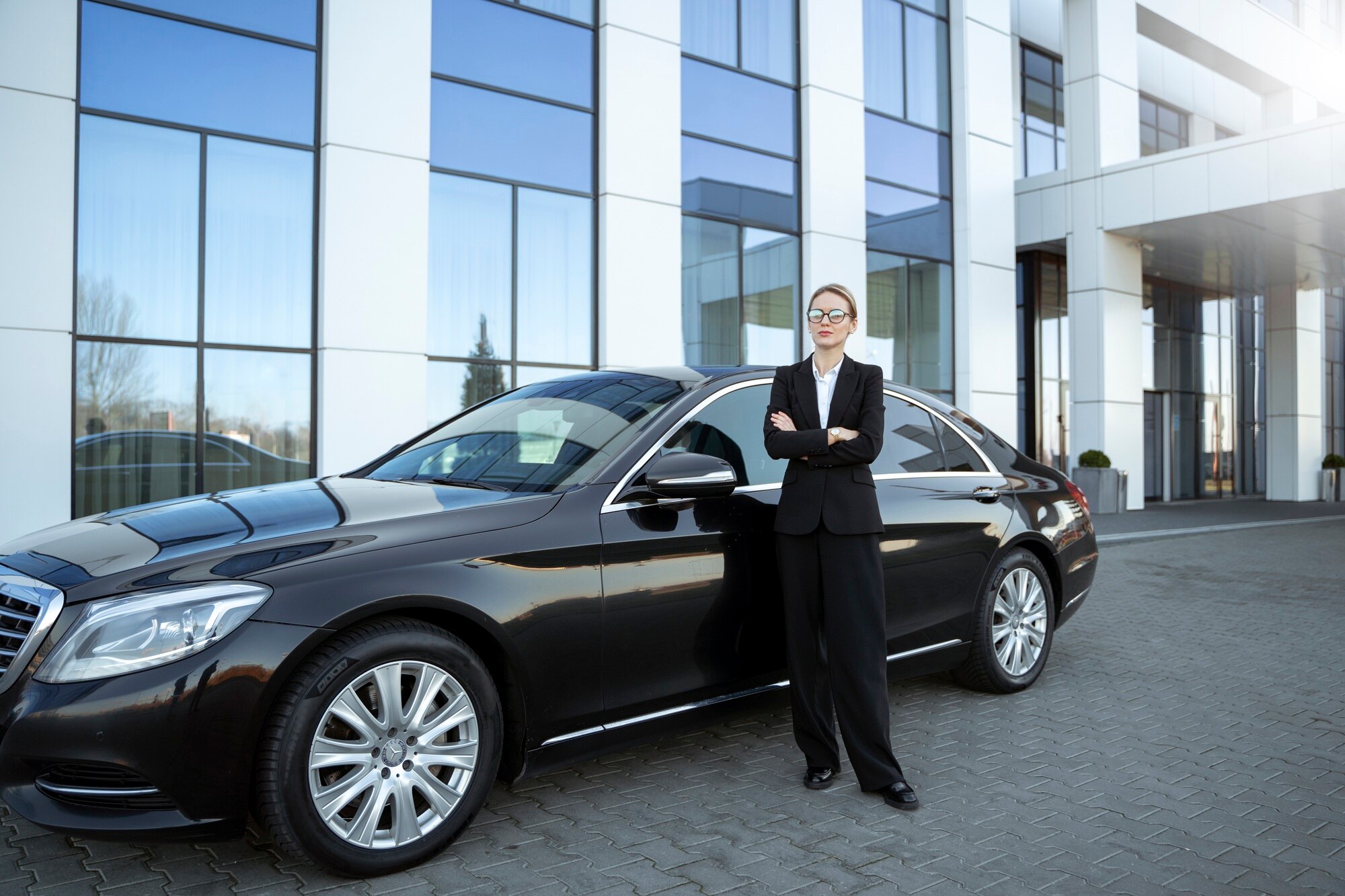 Executive client stepping into Mercedes S-Class for corporate travel under customised chauffeur solutions Manchester