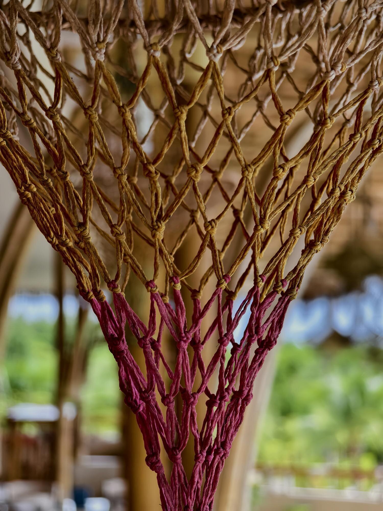 elegant wicker lamp suspended from a rustic wooden cf2a9b88fc3b21f45e9b