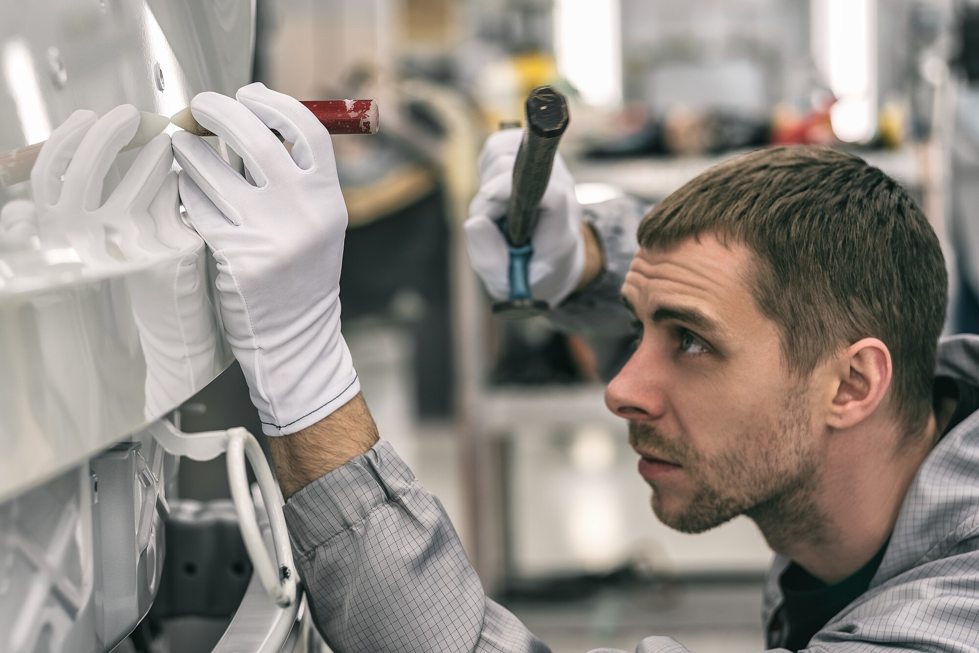 Cut Waste, Save Time: How Precision Plastic Fabrication Keeps Projects on Track 1 employee of an automobile factory fixes small meta c86eceddfee02c1d76b5