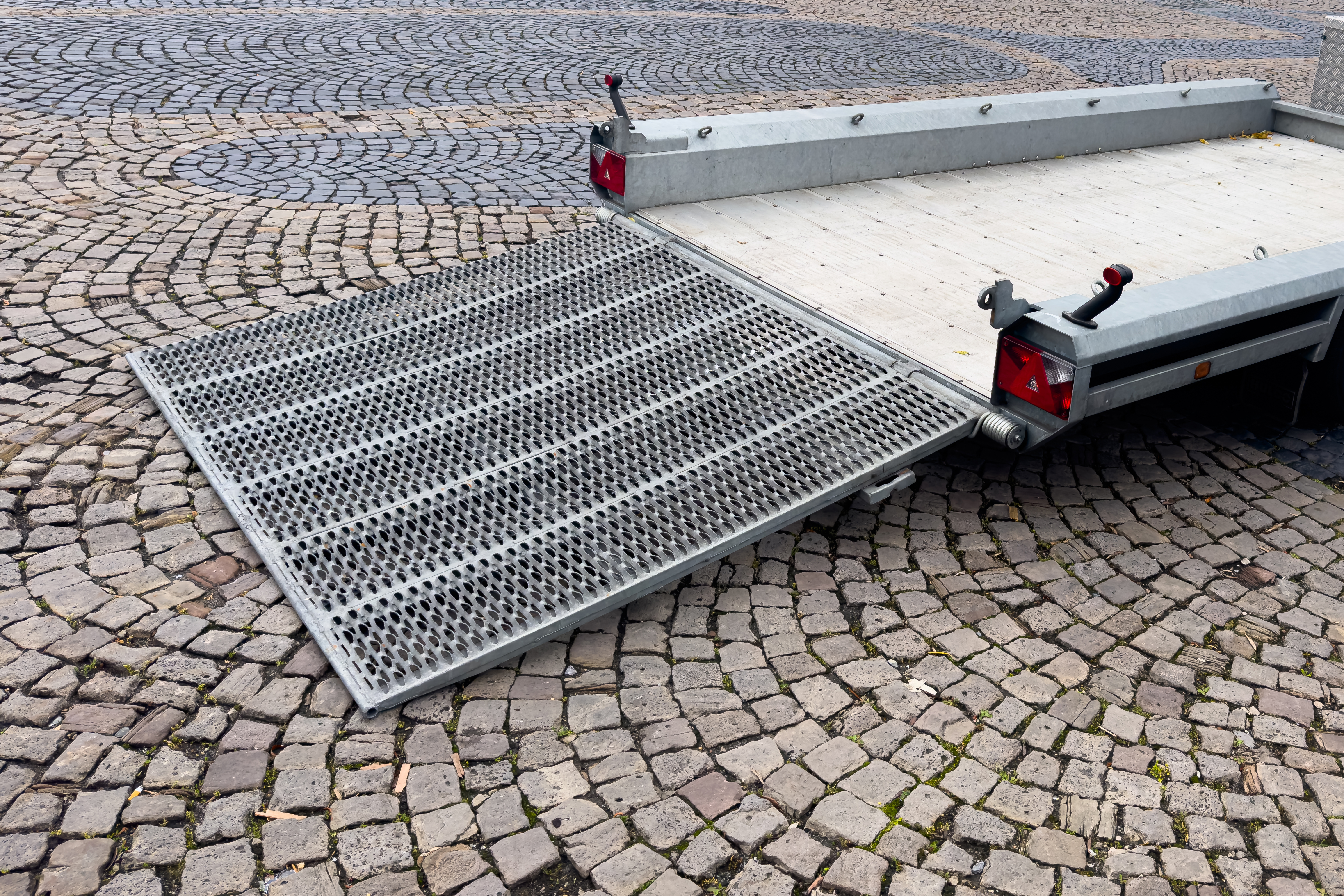 empty auto trailer with lowered ramp ready for lo ebf112988837a383ce4c