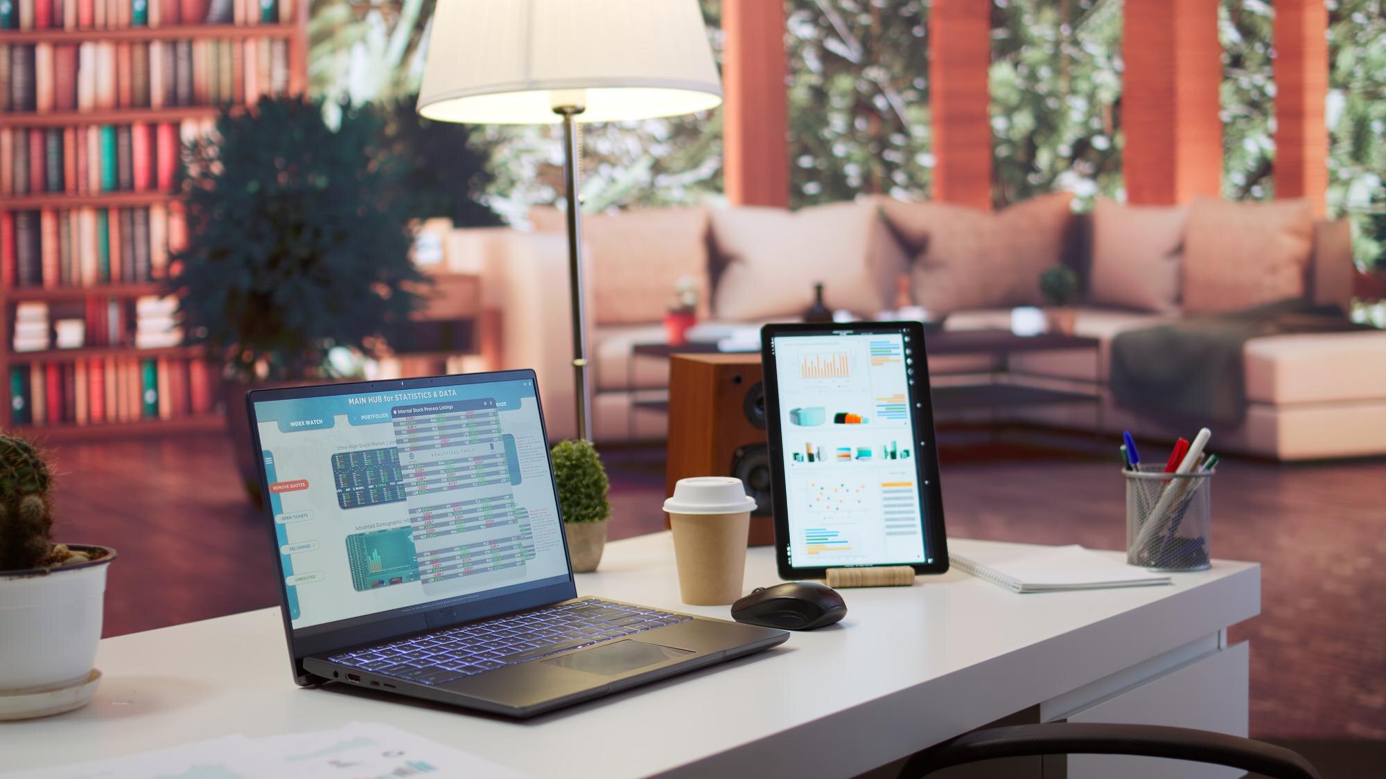 empty home office with tablet and laptop shows inf 7eed700bf1d694fef1cf