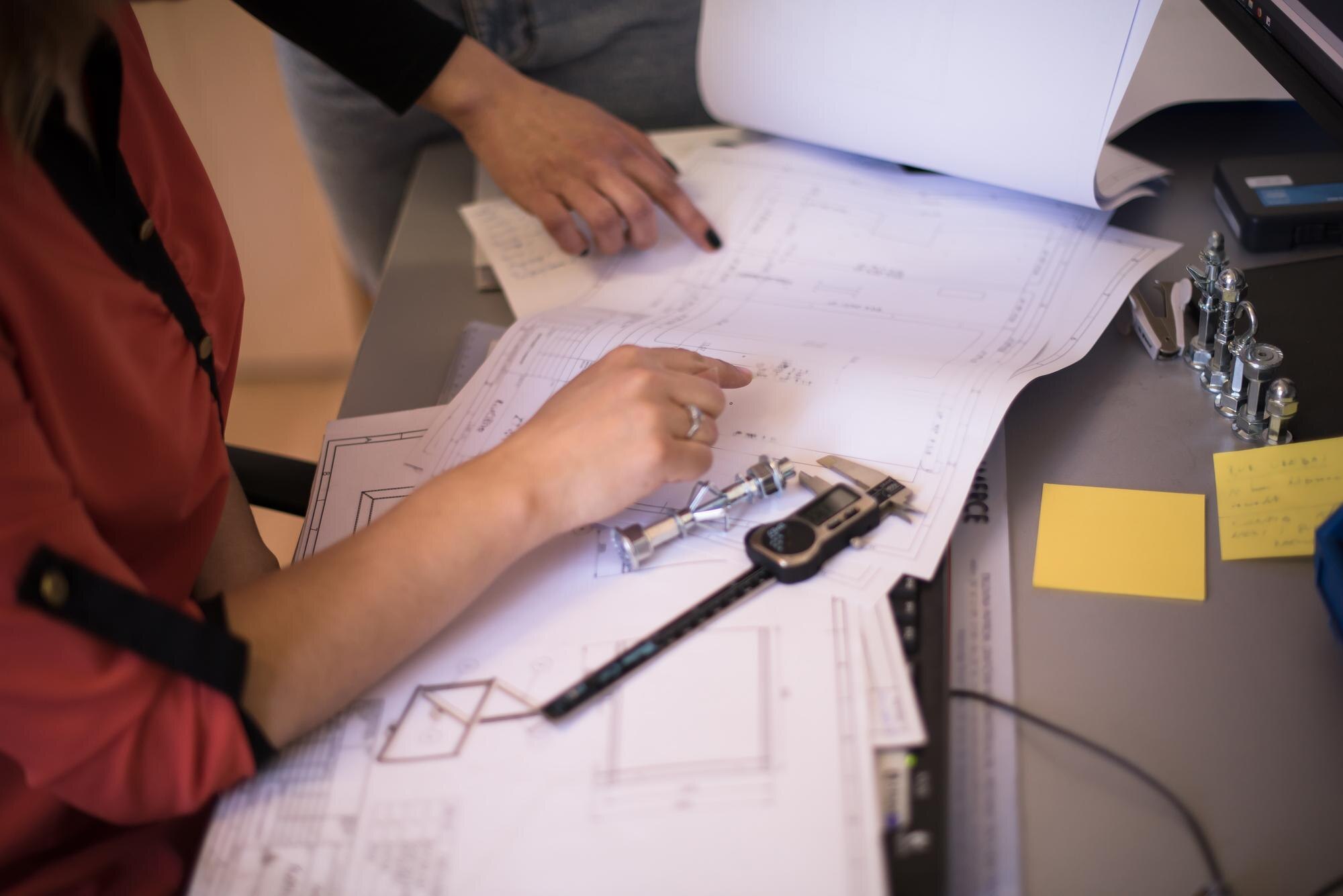 No Hold-Ups: Efficient Project Planning with Custom Plastic Fabrication Services 1 engineer technician designing drawings mechanical 589d8fb3c7053b529ef8