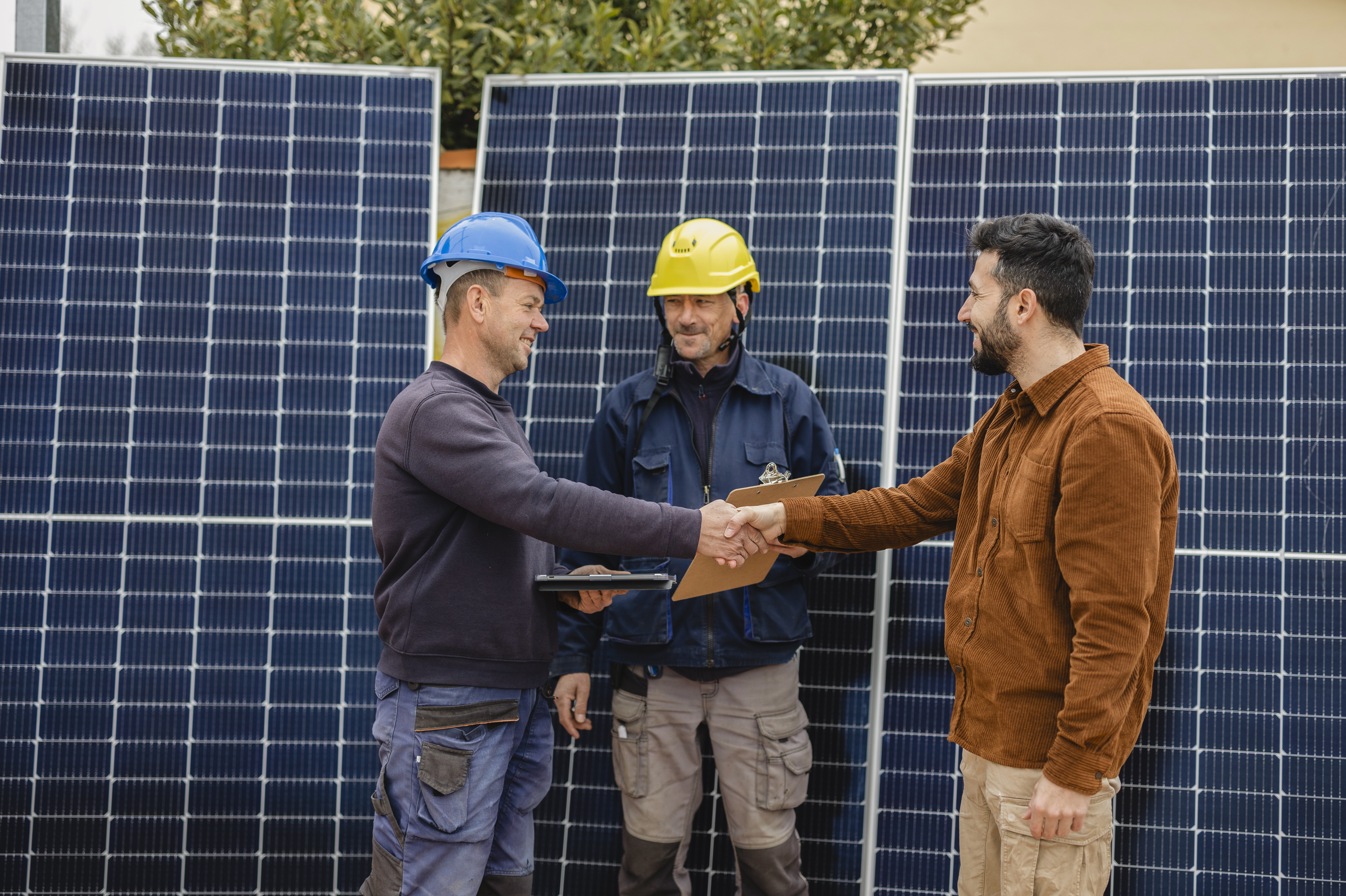 The Importance of Local Expertise in Solar Installations: A Guide to Choosing the Right Installer 3 engineers shaking hands with customer after instal 42c34cea6b93608c9838