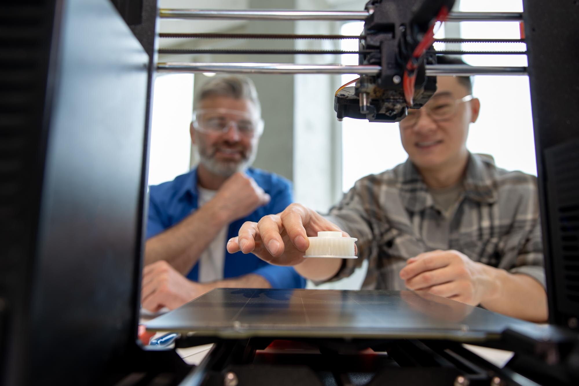 How Advanced Local Fabrication Technologies Improve Plastic Product Quality 1 engineers working with 3d printer process of print 9b77bb8efa32121861be
