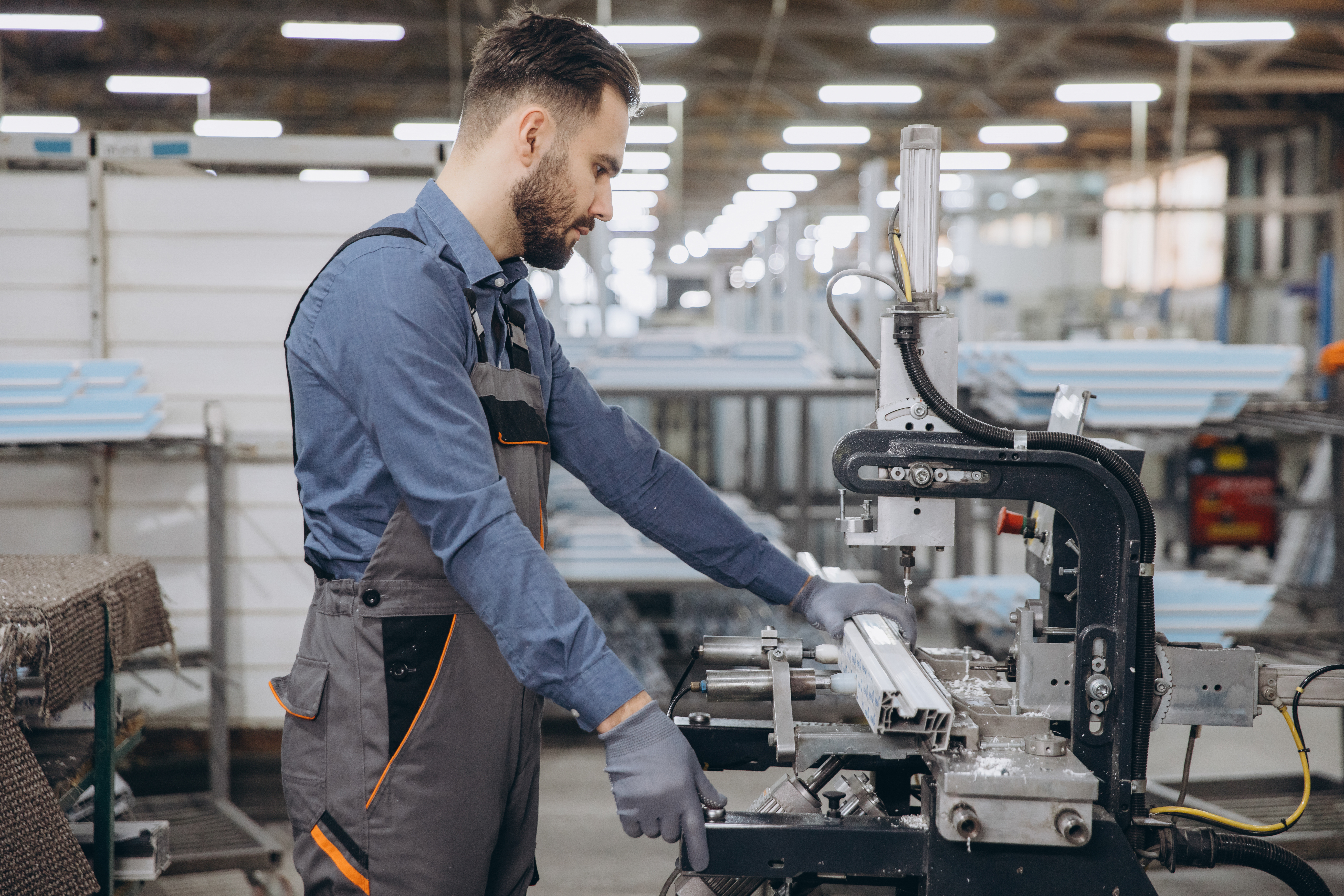 Nail the spec, hit the deadline: How custom plastic fabrication boosts precision and efficiency 3 factory worker operating industrial machinery prod 2122384e7faadfc8e709
