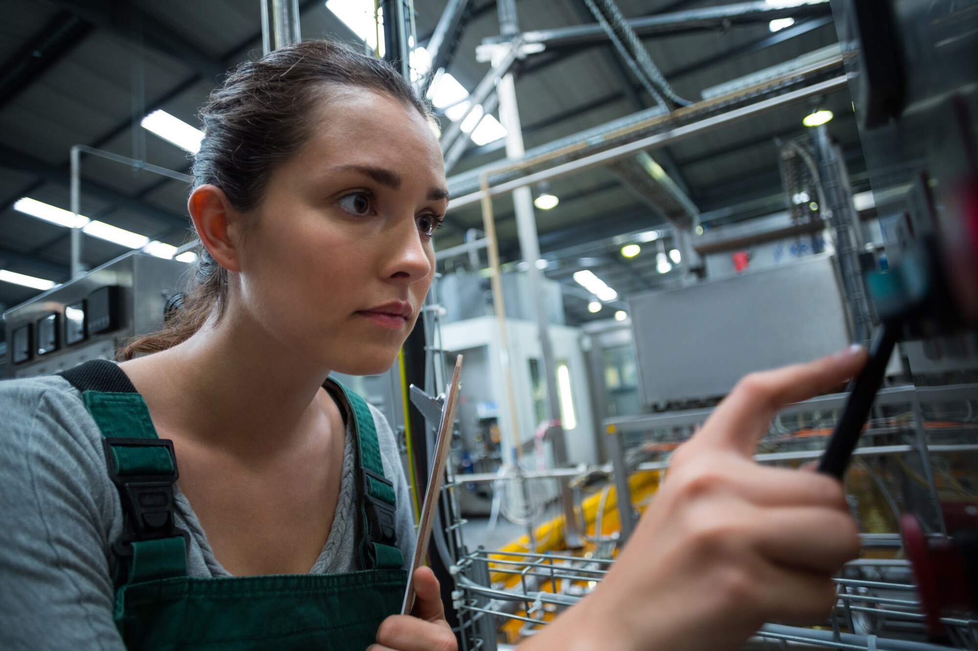 Made Local, Delivered Fast: How Australian Manufacturing Keeps Your Jobs Moving 1 female factory worker operating machine 7e7a7d8ed564f053f0ca
