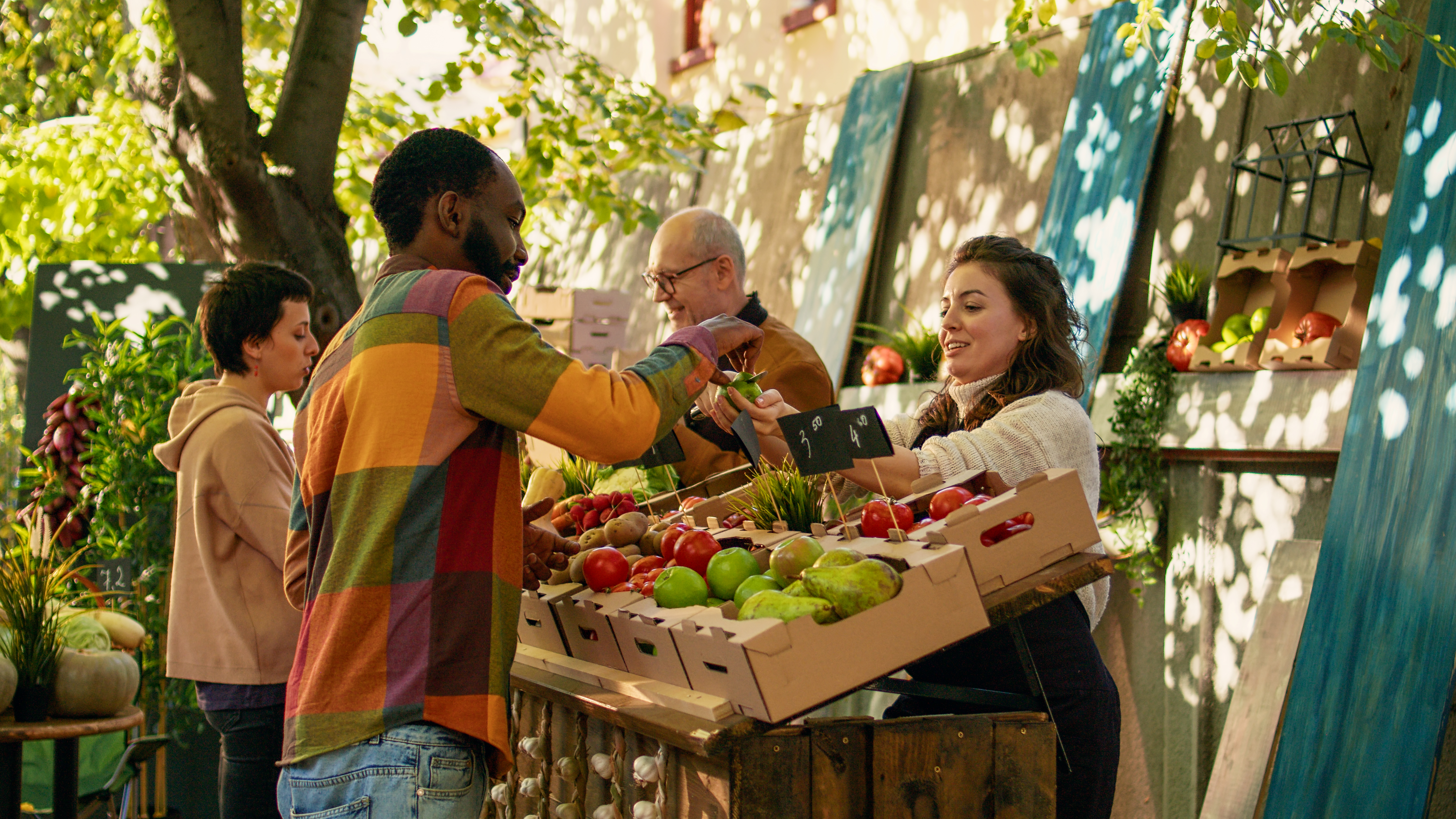 Cultivating Knowledge: How Agricultural Awareness Benefits Families and Local Businesses 3 female farmer giving free apple samples to clients 81f9707505e6632b36ce