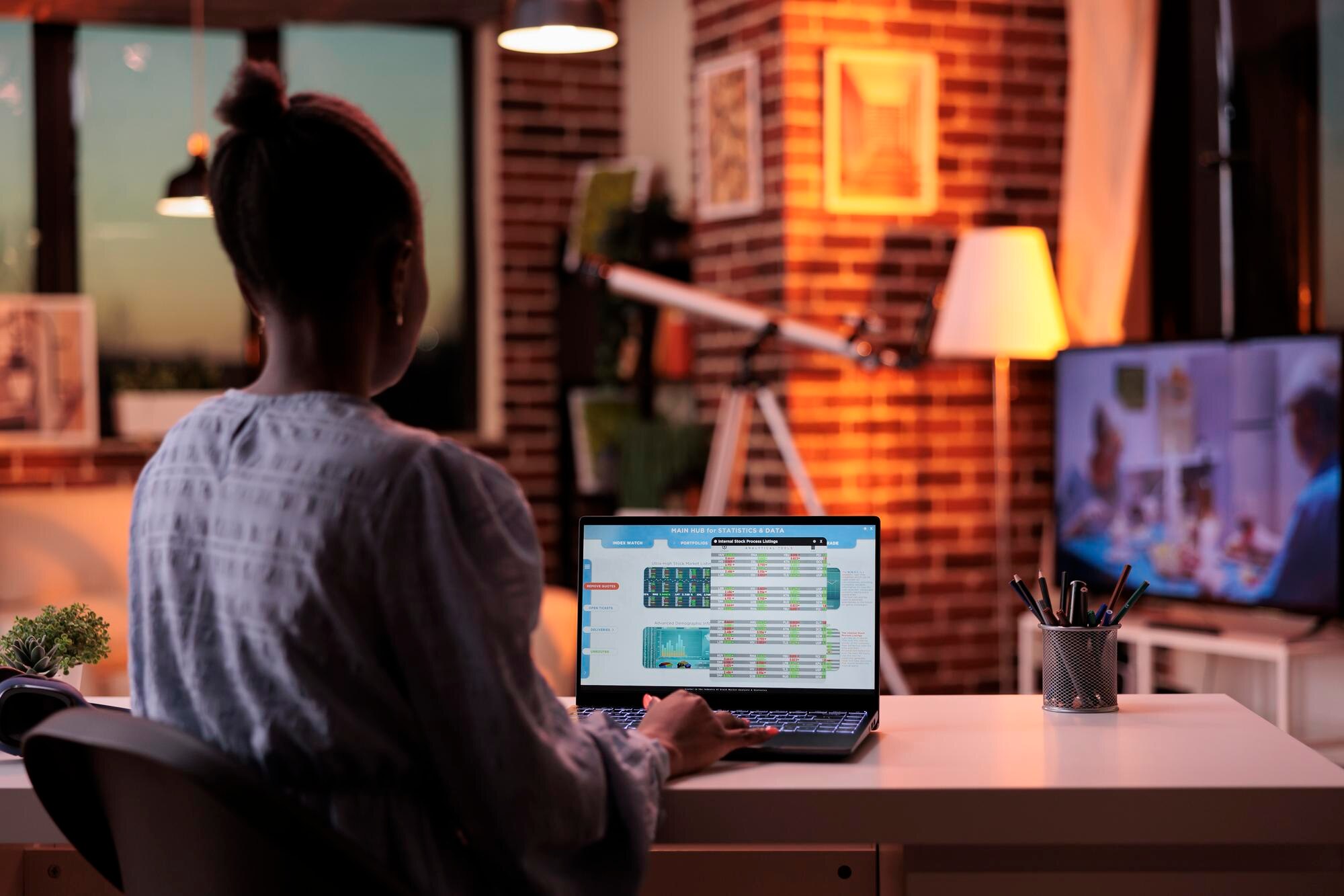 female remote accountant looking at company statis c58823b4d9c877aa1337