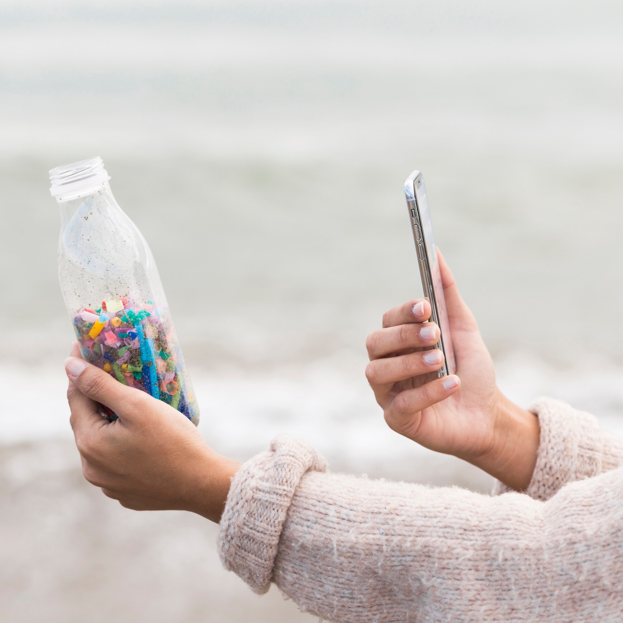 Cut Waste, Cut Costs: Tailored Plastic Solutions for Trade and DIY 1 female taking photo of bottle with plastic 818a9d99ac12b9cfe14e
