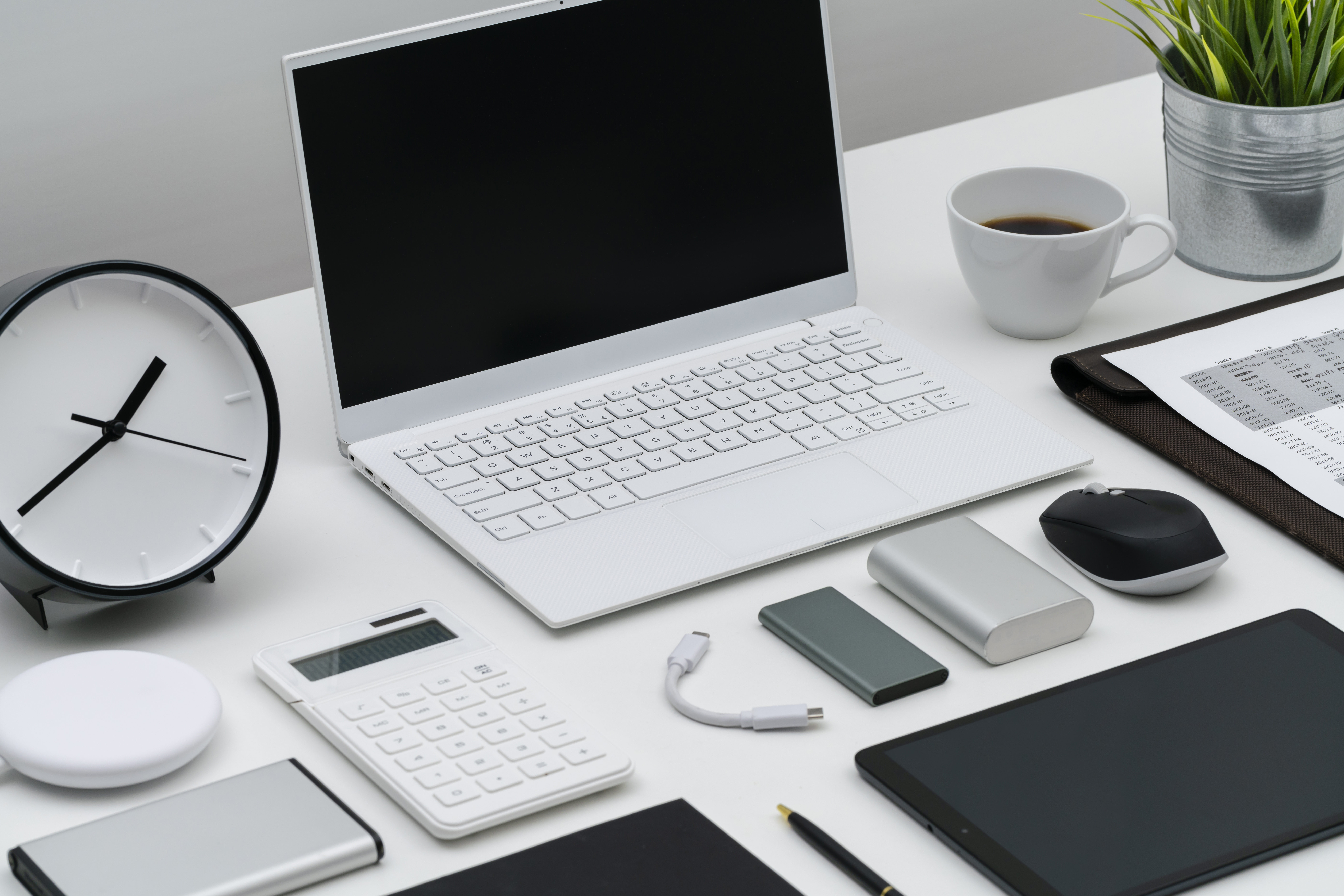 flat lay of office desktop and gadgets 09428ea03a1169f0d71b