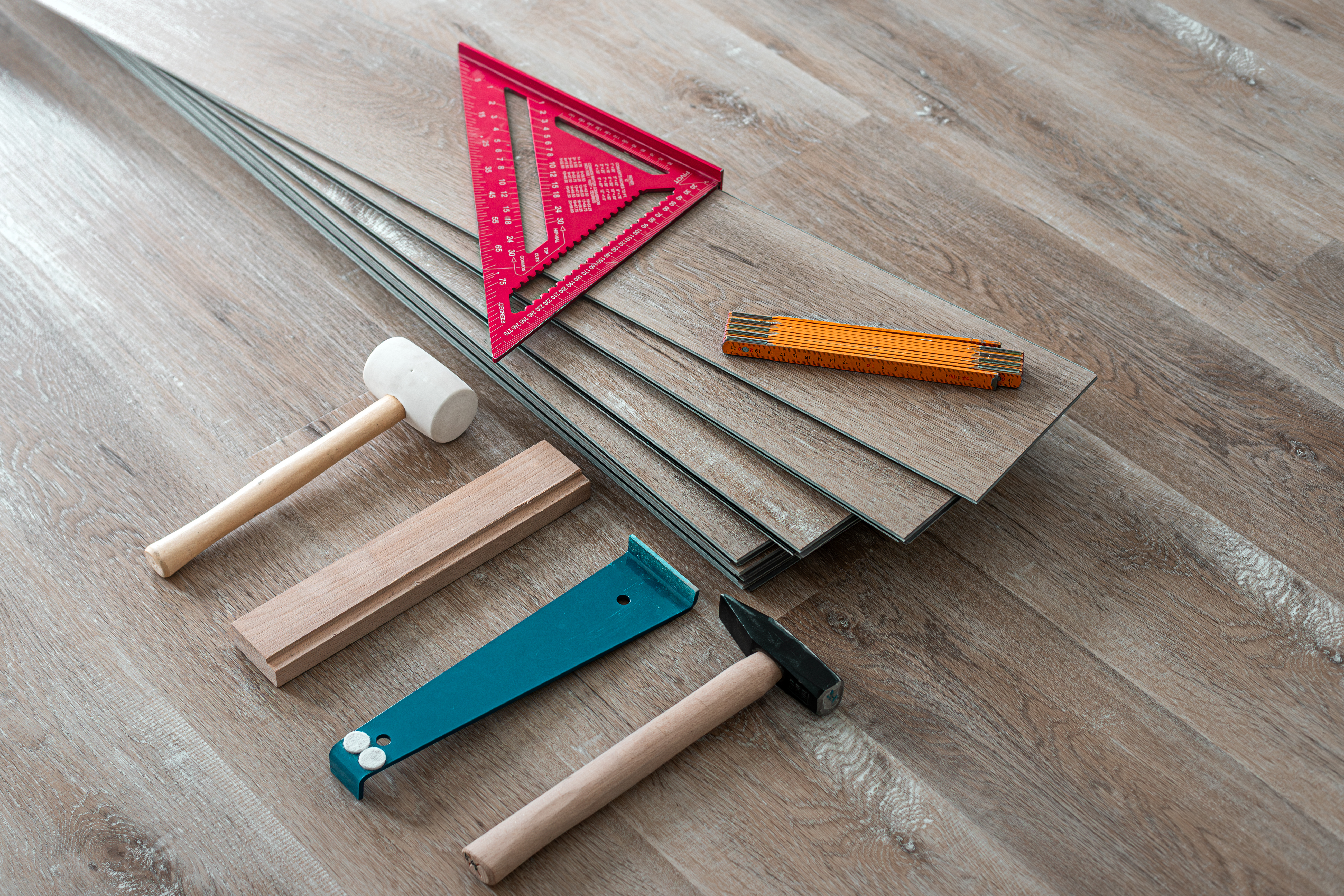 Floating floor work the boards of vinyl plank wit 5ac4e781ff564a79374b